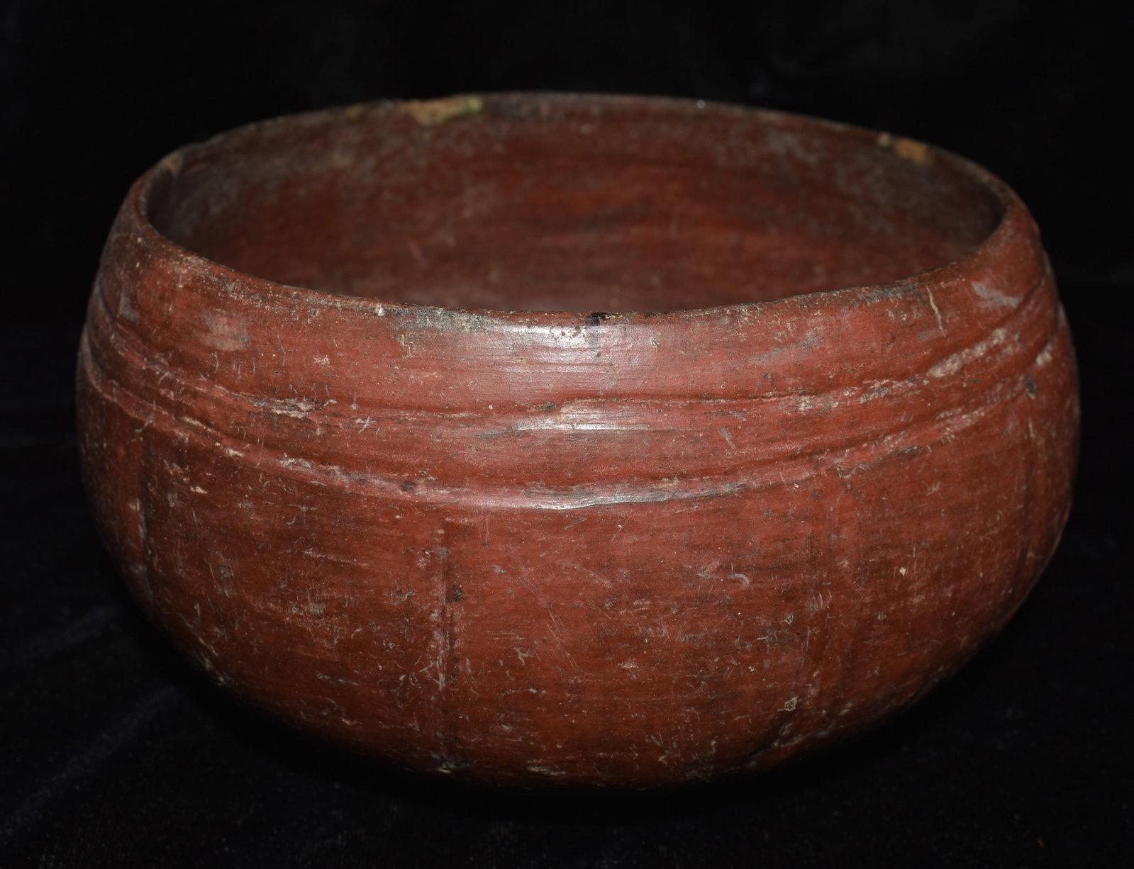Pre-Columbian Mayan Incised Polychrome Pottery Bowl: Pre-Columbian Mayan Incised Polychrome Pottery Bowl. Exhibits correct manufacture and excellent patination. A section on one side of the bowl has been glued back in place as shown in photos. Measures 