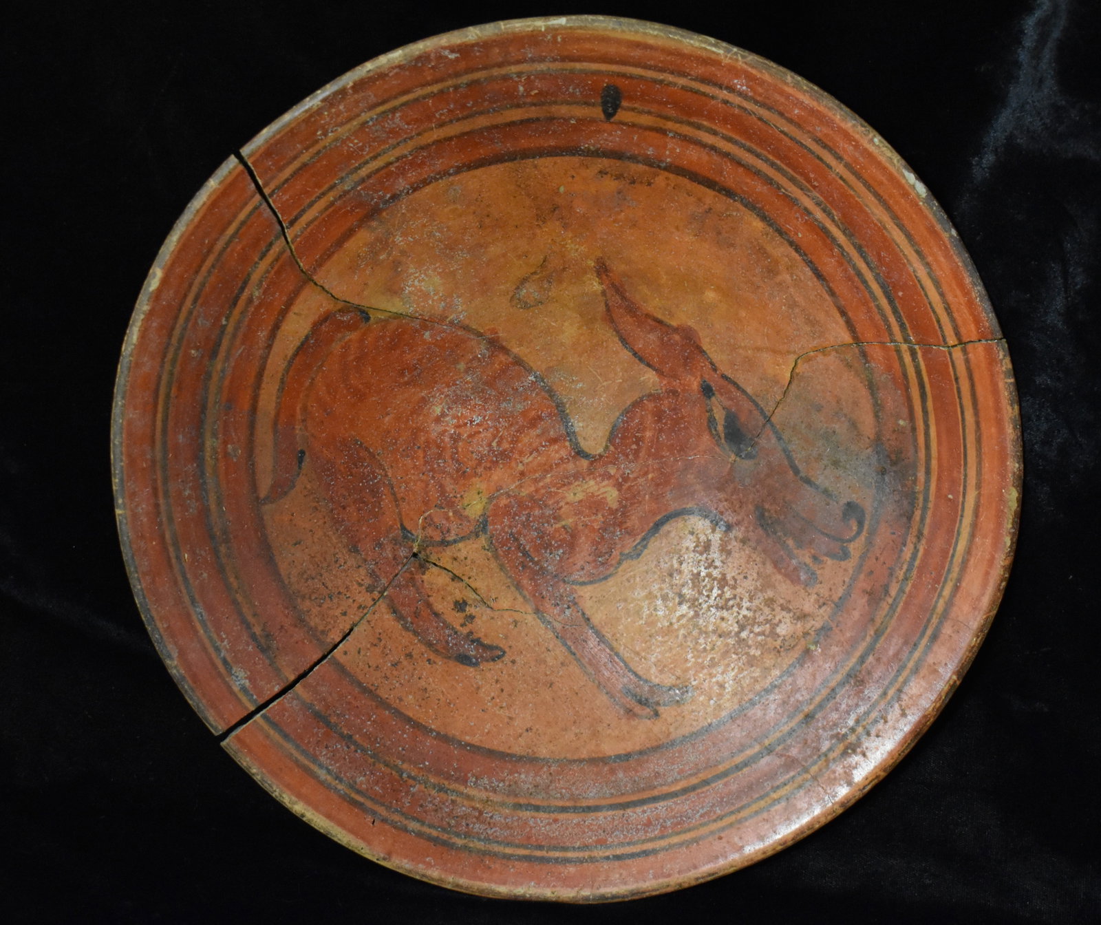 Pre-Columbian Mayan Polychrome Pottery Plate w/ Zoomorphic Painting 600-900 CE: Pre-Columbian Mayan Polychrome Pottery Plate. Late Classic. Portrays an animal spirit or companion or perhaps a portrayal of the legendary Chupacabra. Has traveling cracks from 3 sides that were secur