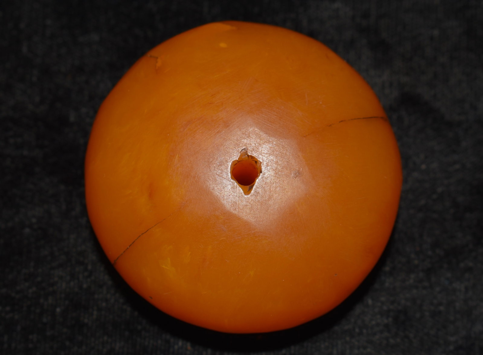 LARGE BUTTERSCOTCH AMBER BEAD - 54 Grams Tested: LARGE BUTTERSCOTCH AMBER BEAD. Very large amber bead made from natural amber by tribal peoples in Africa. This bead was part of an African necklace. The necklace had to be disassembled to test that th