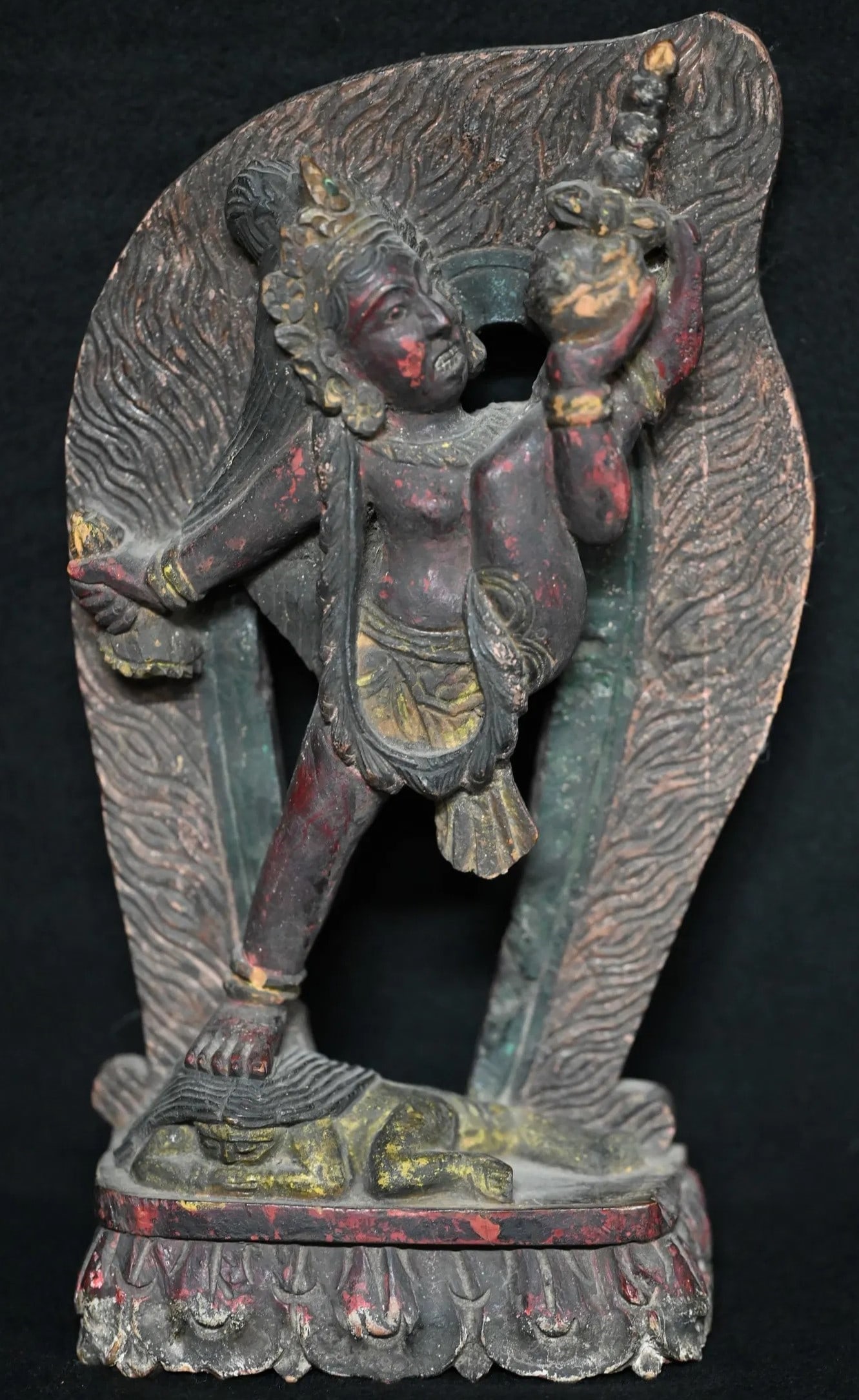 19th Century Temple Carving of Kali Standing on Lord Shiva: 19th Century Temple Carving of Kali Standing on Lord Shiva. In Hindu mythology, Kali is often depicted standing on the chest of her consort, Lord Shiva. This imagery symbolizes the dynamic interplay b