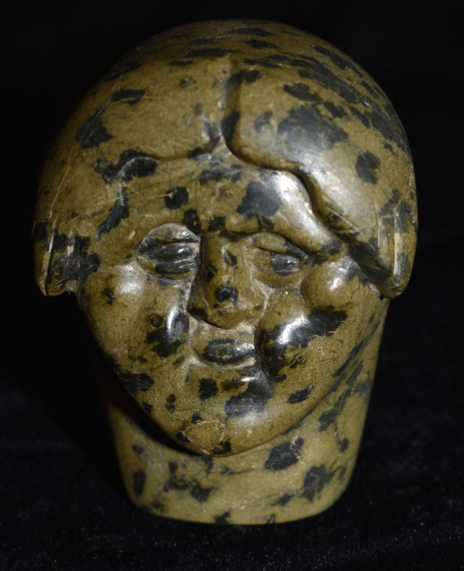 Vintage Eskimo Stone Bust (Female Head): Vintage Eskimo Stone Bust (Female Head). Increased detail went in to this artists piece on the face. They hand polished the face to accent it in the work. No makers mark noticed on this Eskimo art pie