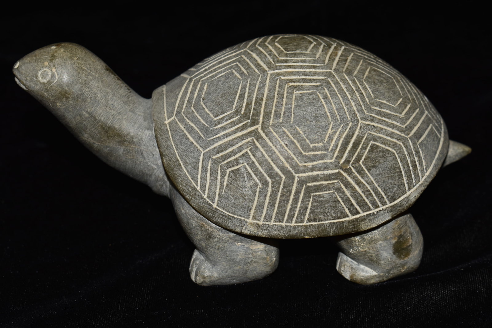 Vintage Inuit Eskimo Art Stone Turtle Carving: Vintage Inuit Eskimo Art Stone Turtle Carving. Mark similar to a star on the bottom which is likely a makers mark. Material appears to be a form of soapstone. Measures 6 3/4" long, 3 3/4" wide and 3 i