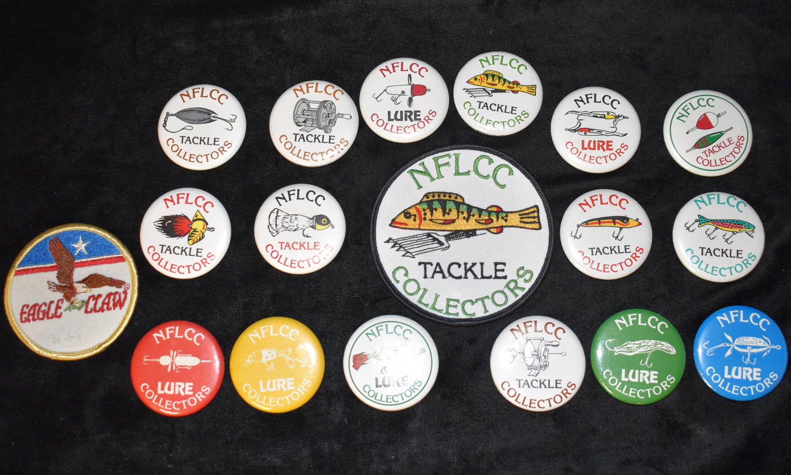 Vintage Collection of NFLCC Tackle Collectors Pins and Patches 17: Vintage Collection of NFLCC Tackle Collectors Pins and Patches. 15 pins with various lures exhibited on them. One large 4" NFLCC Patch and an Eagle Claw patch. All are in nice condition as shown in ph