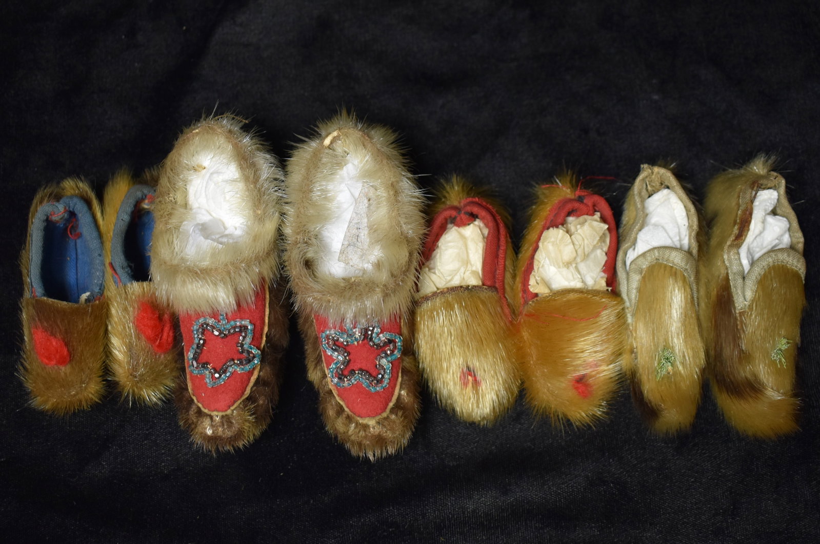 4 Pair of Native American Doll Moccasins - 1920's-1930's California: 4 Pair of Native American Doll Moccasins - 1920's-1930's California. These small moccasins were made by the Chumash, Serrano, Gabrielino, Cahuilla, Kumeyaay, Maidu, Miwok, Yokuts, Yurok, Karok, Hupa, 