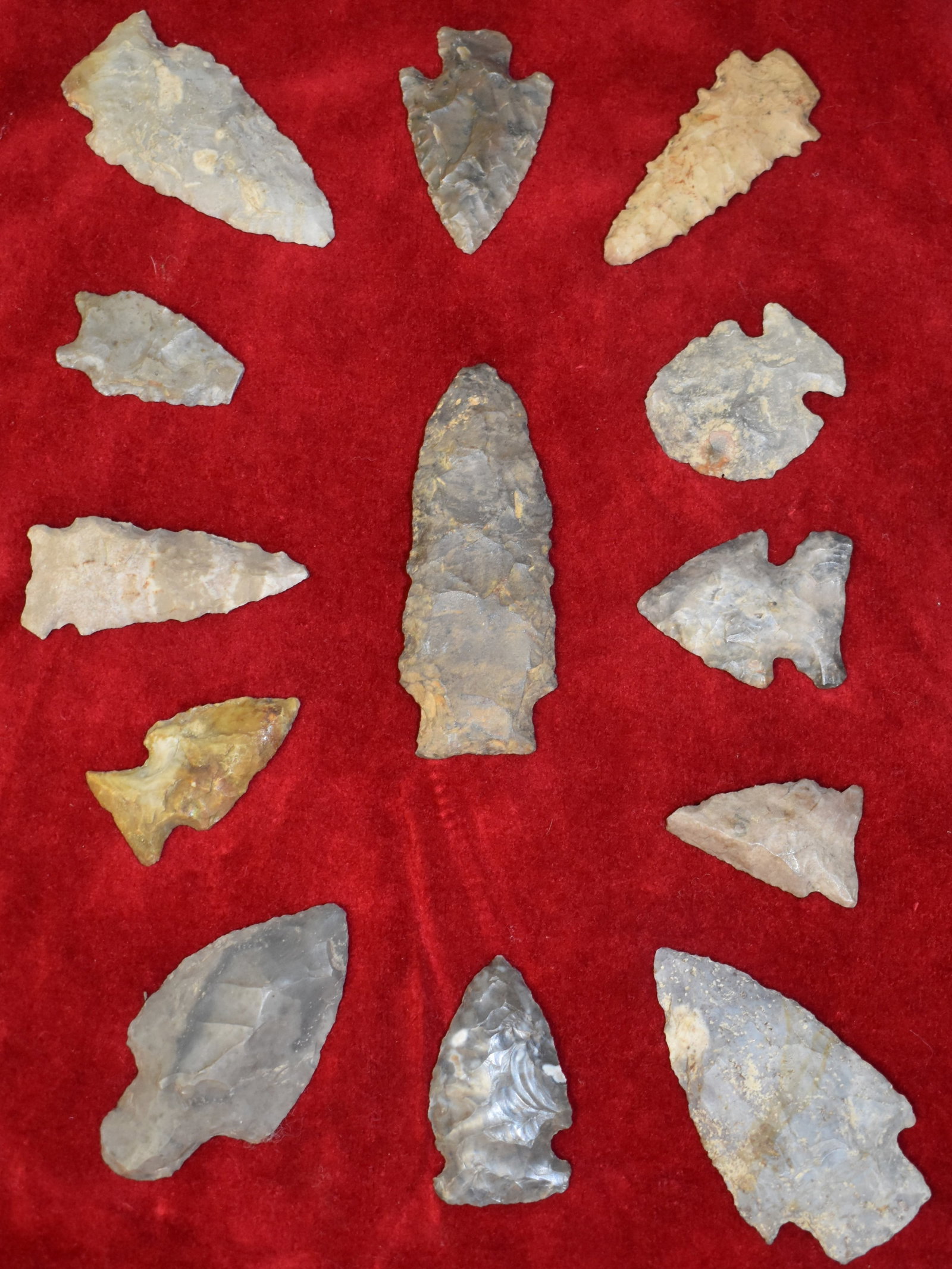 Frame of 13 Arrowheads found in South Western Missouri: Frame of 13 Arrowheads found in South Western Missouri. Points in the frame measure 1 3/8" to 3 1/8". Frame measures 12" by 8". Ex Tim Patrick Collection.