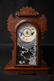 Waterbury Clock Company Mantle Clock In working order. Stands 17 1/2 inches tall. The key is