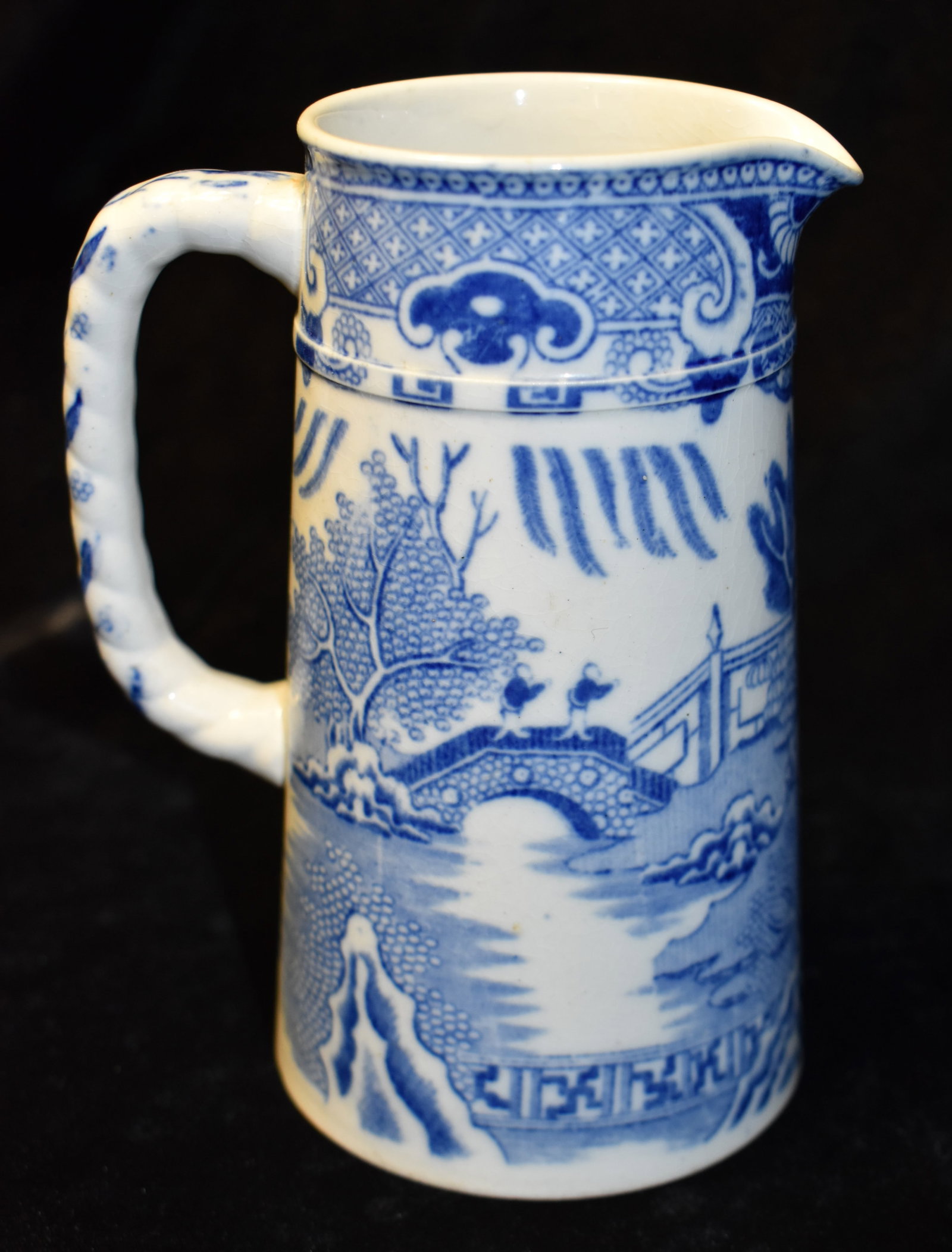 6 1/8" Antique Willow Ware Pitcher - 1886-1905: 6 1/8" Antique Willow Ware Pitcher - 1886-1905. The W.A.A. mark on this willow ware stands for William Alsager Adderley & Co., a pottery manufacturer based in Longton, Stoke-on-Trent, England. This co