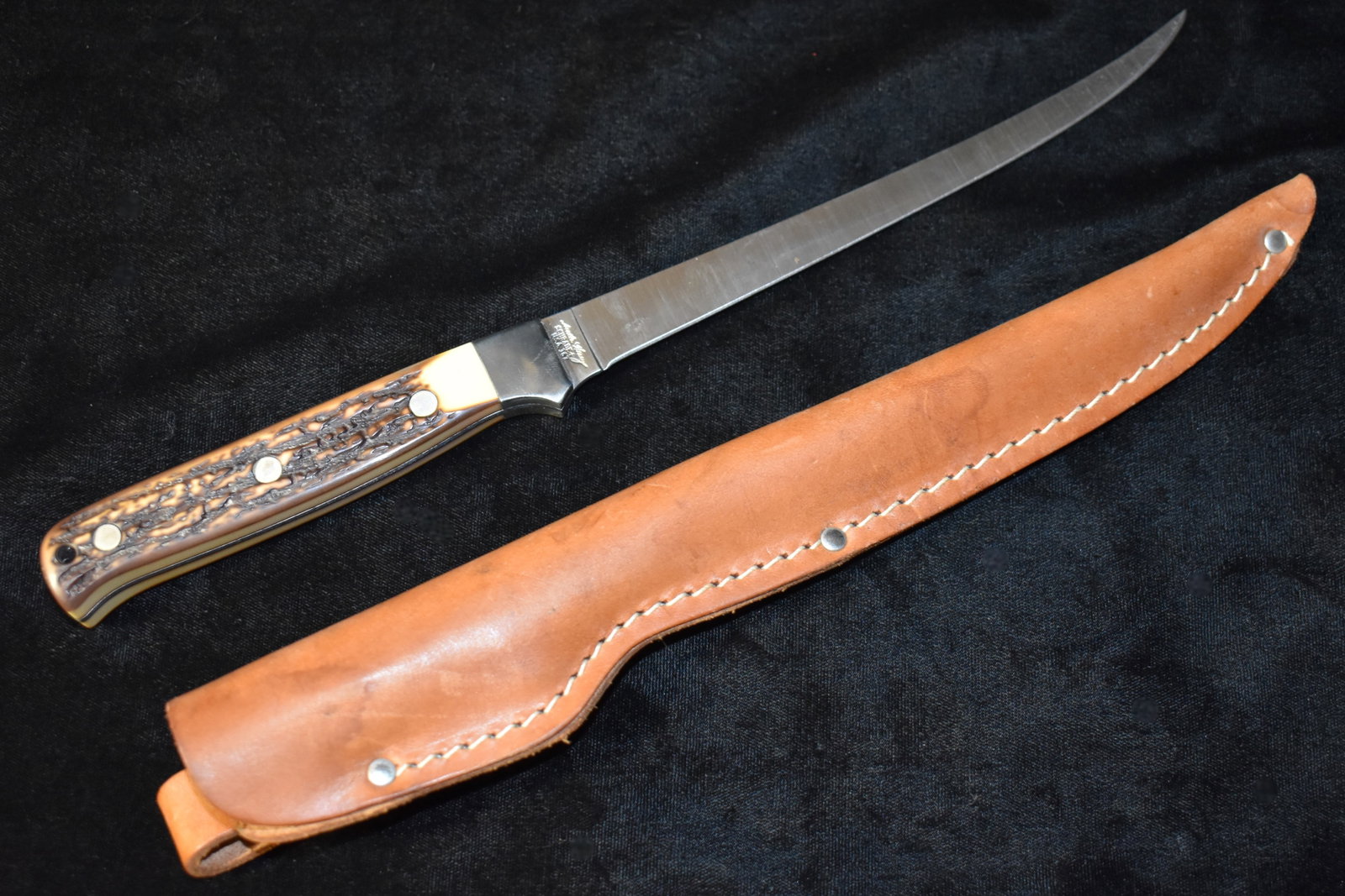 VINTAGE SCHRADE + UNCLE HENRY 167 FILLET KNIFE W LEATHER SHEATH: VINTAGE SCHRADE+ UNCLE HENRY 167 FILLET KNIFE W LEATHER SHEATH. Near New Condition. Appears unused. The Schrade Uncle Henry 167 fillet knife, also known as the Steelhead, was originally produced in th