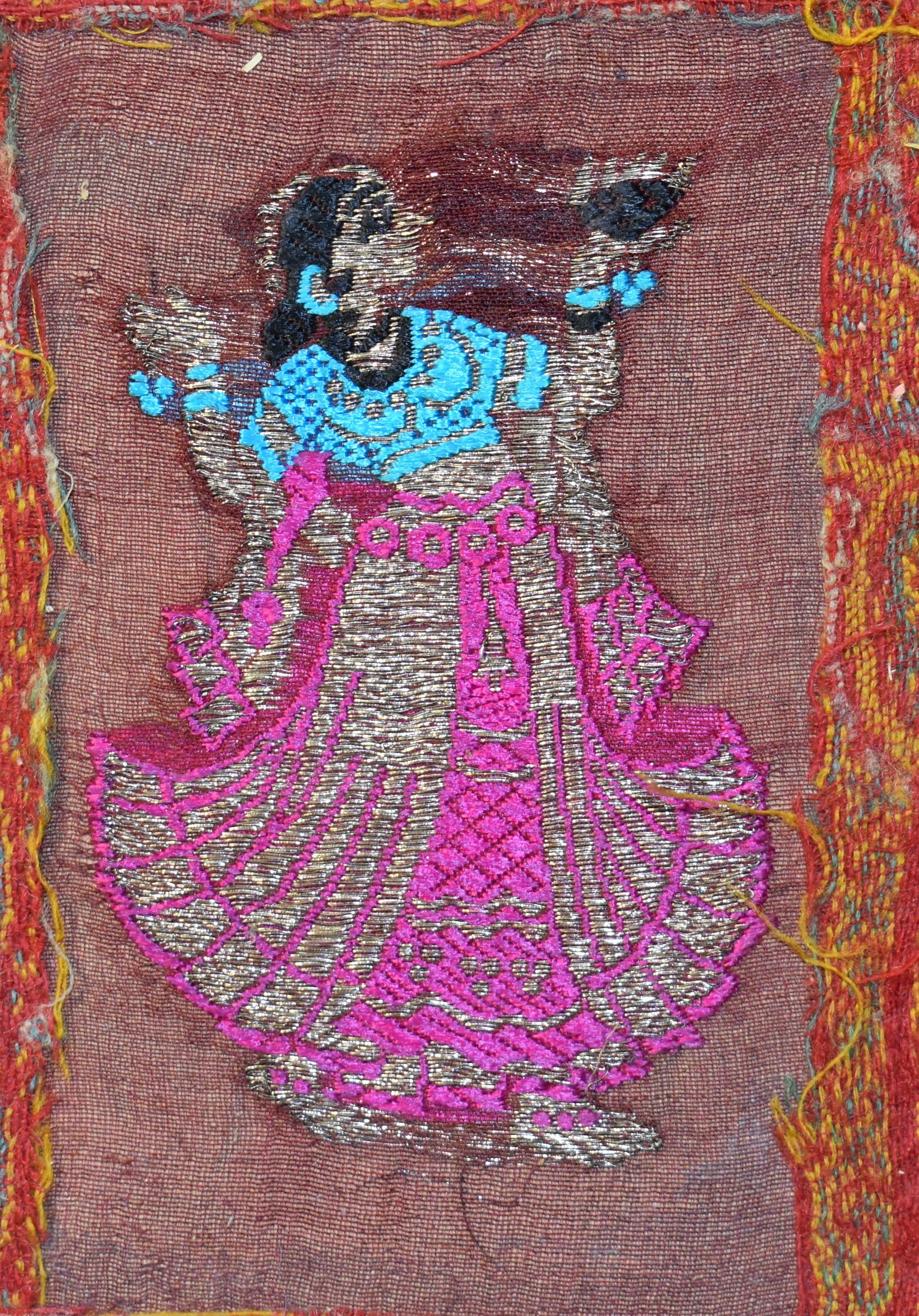 200 Year Old Pakistani (Mughal) Textile w/ Gold Thread Embroidery: 200 Year Old Pakistani (Mughal) Textile. Hand embroidery depicts a finely dressed Woman Dancing. Textiles from the Mughal period, which includes regions of present-day Pakistan, often featured the use