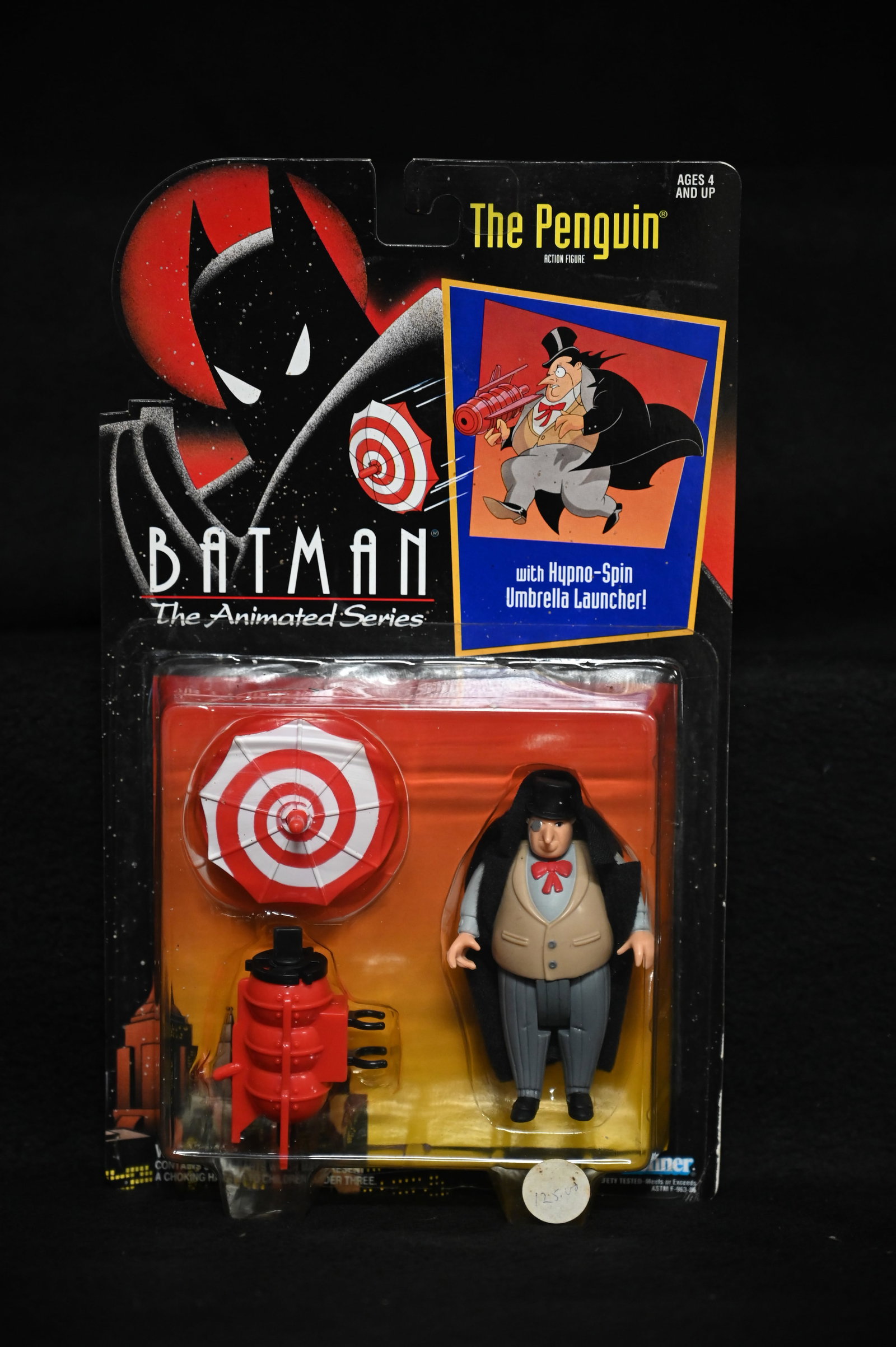 1992 Batman The Animated Series The Penguin with Hypno-Spin Umbrella Launcher Action Figure produced: 1992 Batman The Animated Series The Penguin with Hypno-Spin Umbrella Launcher Action Figure produced by Kenner.