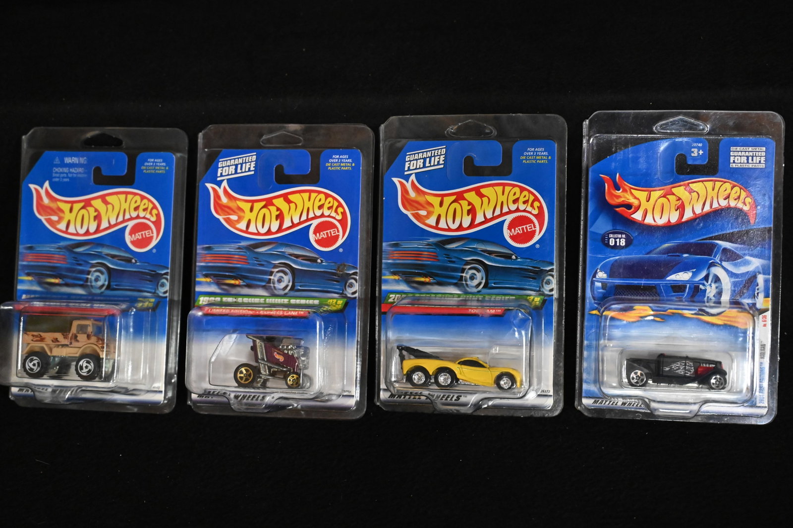 4 Hot Wheels 2000 in hard plastic protective cases. Includes Treasure Hunt Series. All in brand: 4 Hot Wheels 2000 in hard plastic protective cases. Includes Treasure Hunt Series. All in brand new condition.