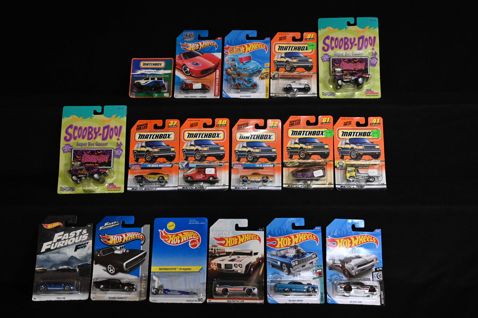Hot Wheels, Matchbox, and Racing Champions Scooby Doo Group Lot of 15 total cars brand new in the: Hot Wheels, Matchbox, and Racing Champions Scooby Doo Group Lot of 15 total cars brand new in the original packaging.
