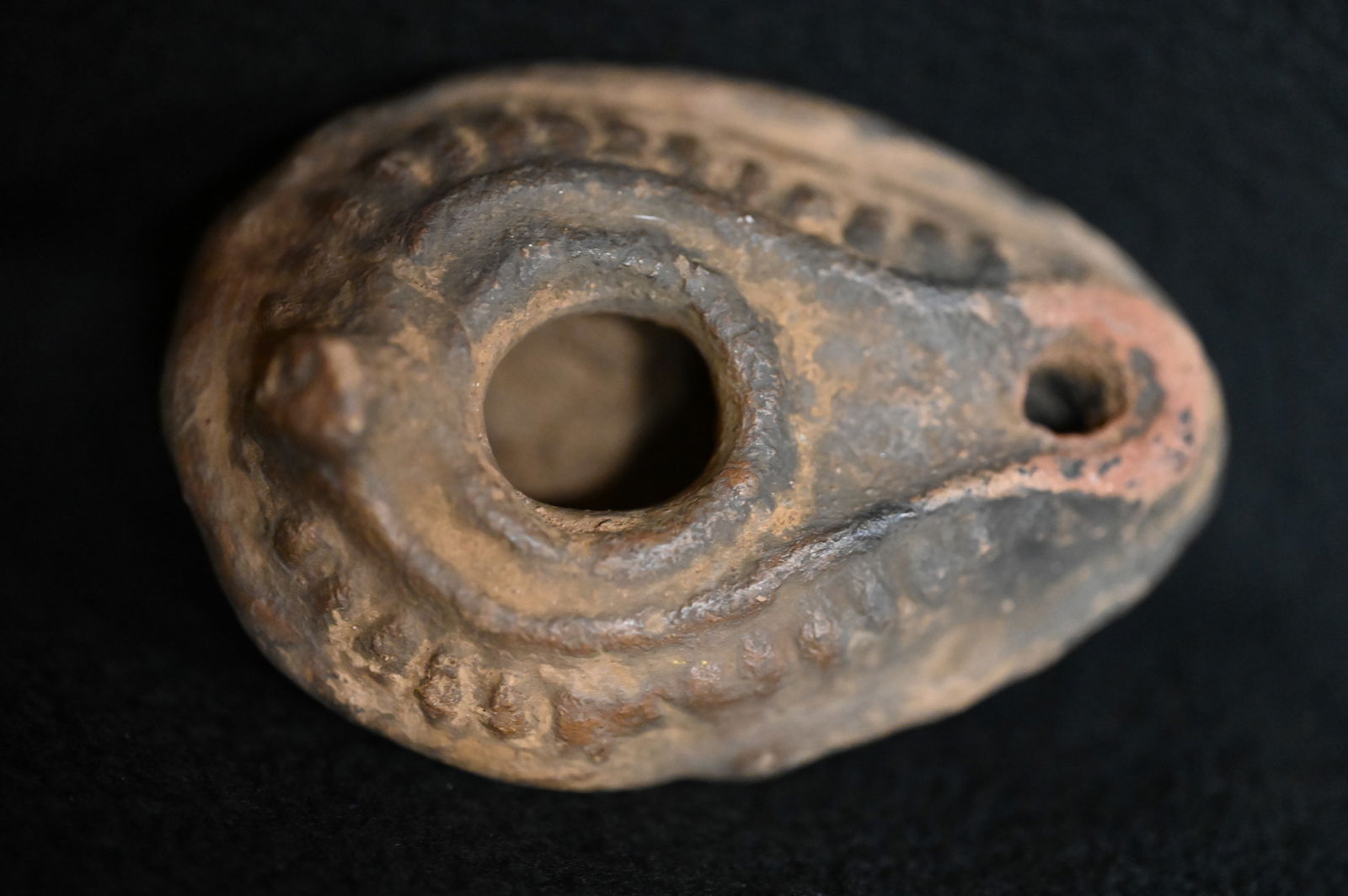 Holy Land Terracotta Oil Lamp Circa 500-700 AD.: Ancient Roman Fired Clay Terracotta Oil Lamp from the Byzantine Era. Used as the main source of light for thousands of years the oil lamp was a very important inventions that was only slightly modifie