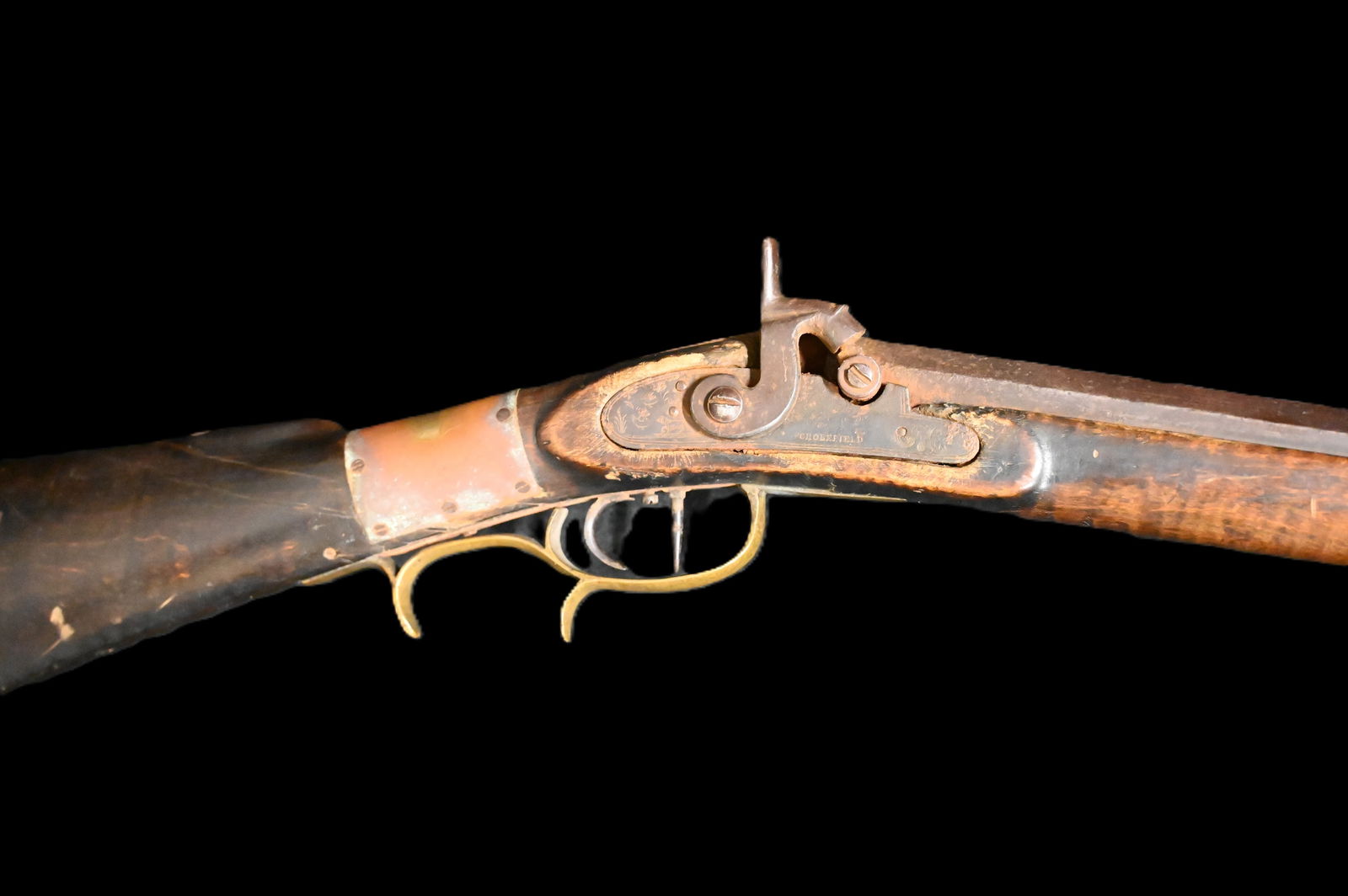 Scholefield Octagon Barrel Full Stock 41 Caliber Rifle: Scholefield Octagon Barrel Full Stock 41 Caliber Rifle measures 47 1/2" long with old wrist repair. Signed Heartman on top of the barrel. This is not a functioning gun anymore and can only be used as