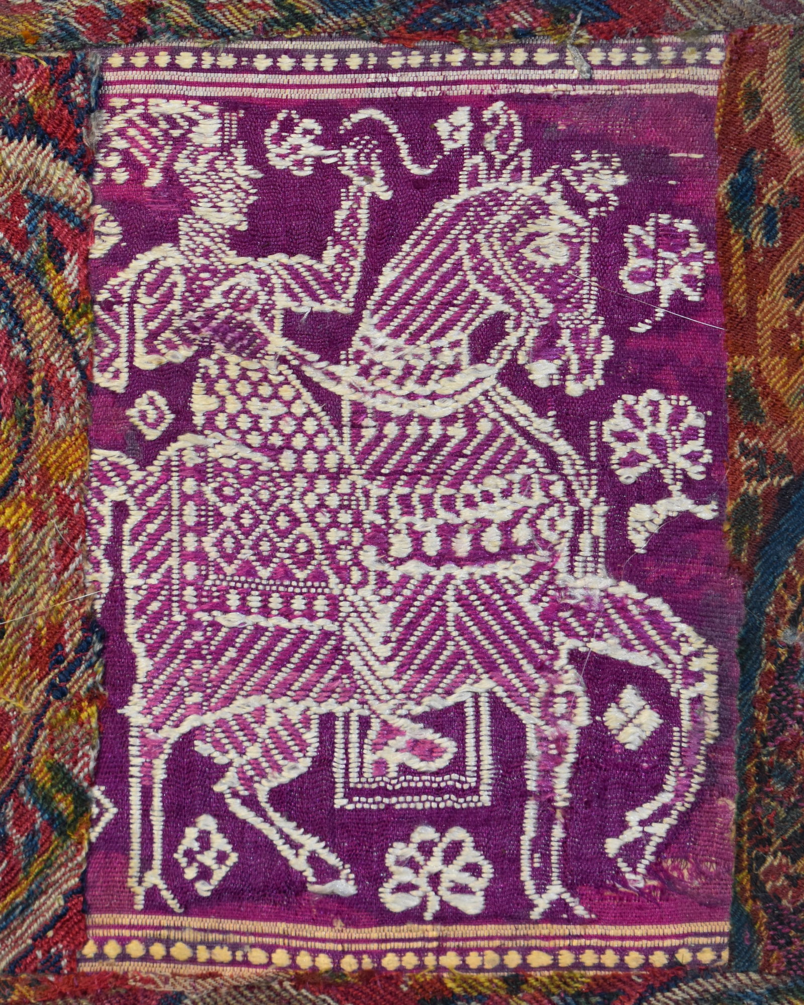 200 Year Old Pakistani (Mughal) Textile - Mughal Noble on a Horse: 200 Year Old Pakistani (Mughal) Textile. Hand embroidery depicts a Mughal Noble on horseback. Textiles from the Mughal period, which includes regions of present-day Pakistan, often featured the use of