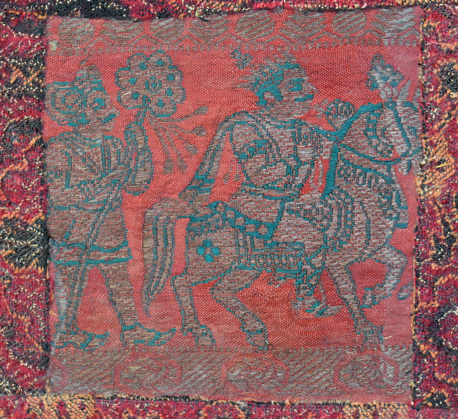 200 Year Old Pakistani (Mughal) Textile - King on a Horse followed by a Servant: 200 Year Old Pakistani (Mughal) Textile - King on a Horse followed by a Servant. Textiles from the Mughal period, which includes regions of present-day Pakistan, often featured the use of gold thread.