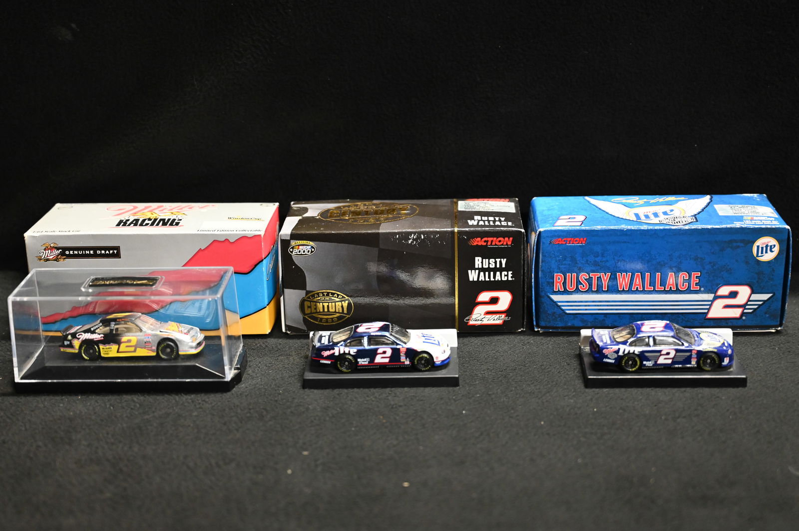 3 Rusty Wallace "Miller Lite" NASCAR Stock Cars 1/64 Scale Produced by Action Racing.  Includes last (1 of 7)