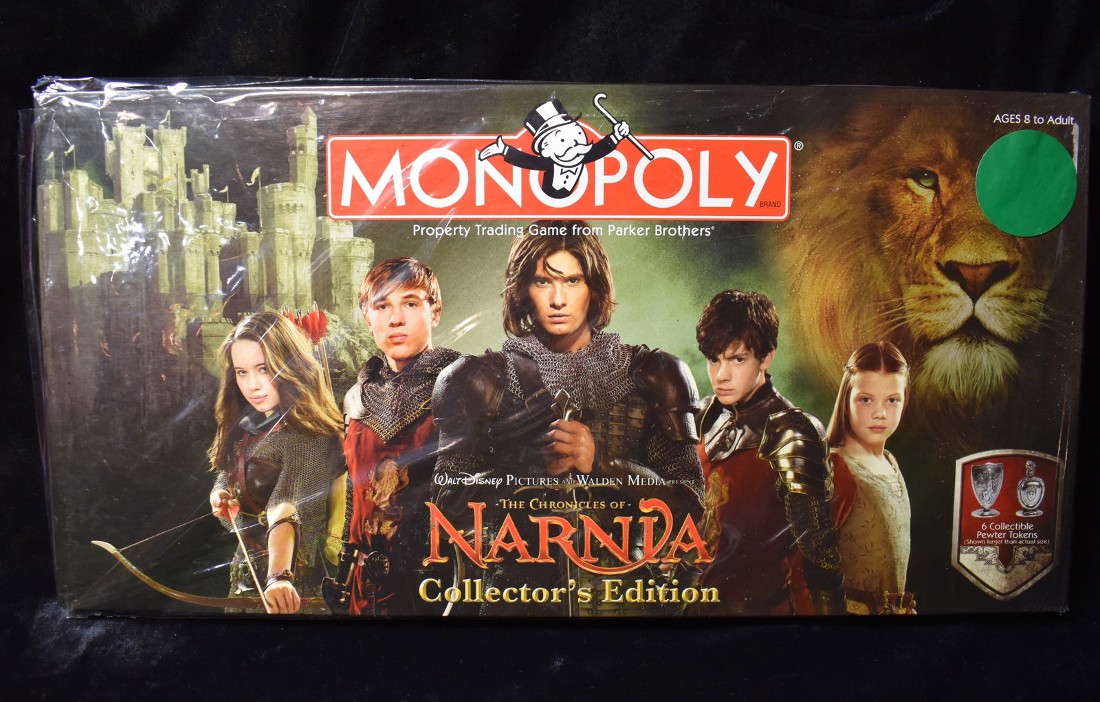 Monopoly Chronicles of Narnia Collectors Edition New old stock from 2008: Monopoly Chronicles of Narnia Collectors Edition New old stock from 2008. Never been opened. Factory plastic is broken though.