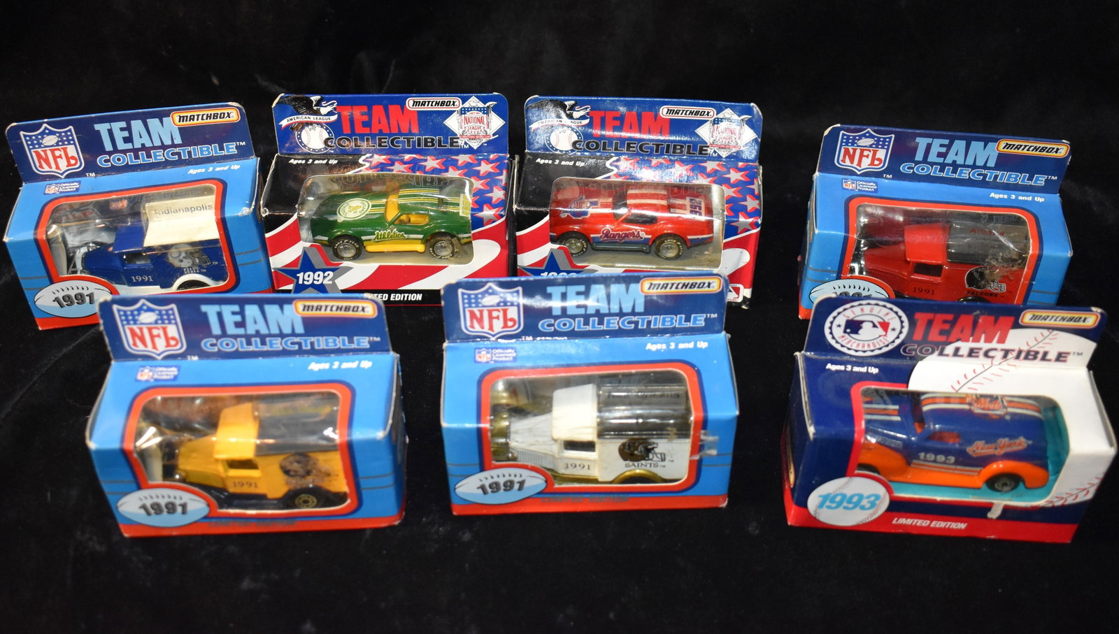 Early 1990's Matchbox Team Collectibles Cars 1:64 Scale Diecast - Rangers, Chargers, Colts, Falcons,: Early 1990's Matchbox Team Collectibles Cars 1:64 Scale Diecast - Rangers, Chargers, Colts, Falcons, A's, Mets, Saints. 1991 & 1992. New in their boxes. Boxes have a little wear. 7 cars.