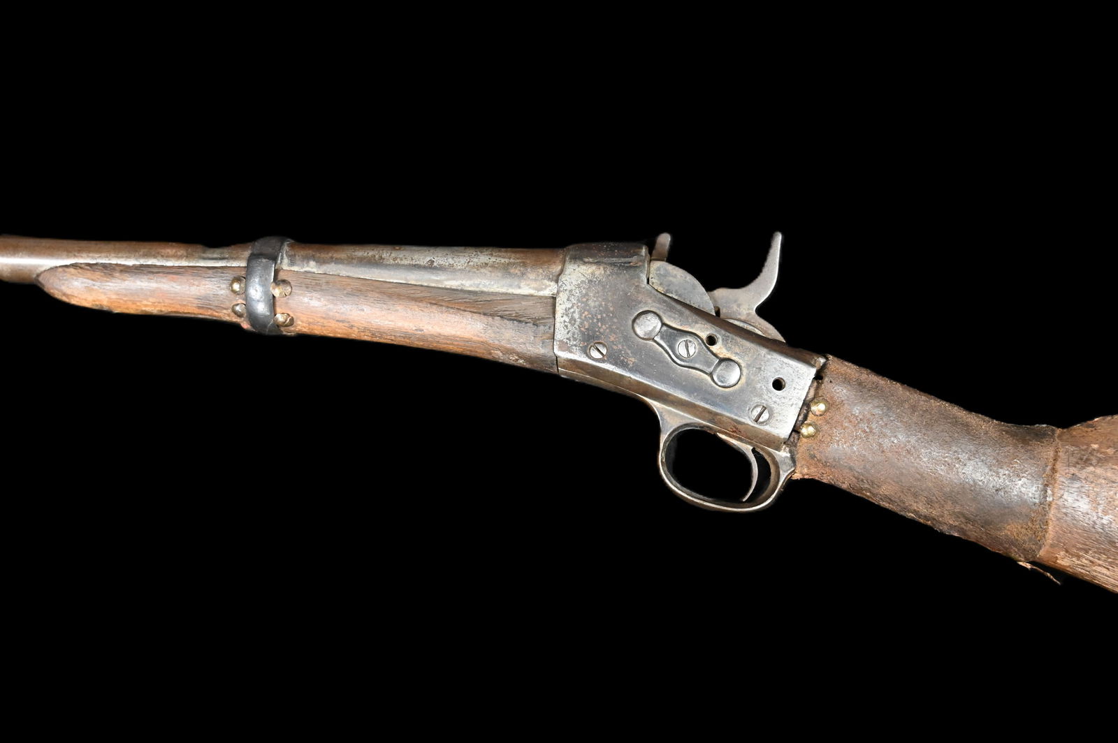 Indian Tacked Falling Block Rifle 36" Long with round barrel. Came from a ranch in Western Texas: Indian Tacked Falling Block Rifle 36" Long with round barrel. Came from a ranch in Western Texas probably Apache or Comanche. Stock is loose and cracked where it attaches to the metal action.