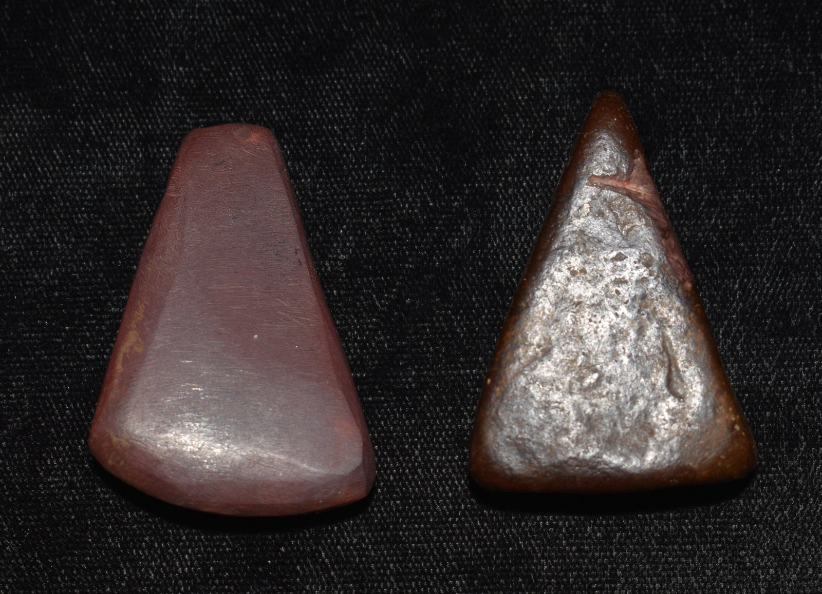 Two Hemitite Stones found in Pettis County, Missouri: 2 Hemitite Stones found in Pettis County, Missouri. Ex George Wolf Collection. One is somewhat shaped like a celt but does not have a sharpened end (most likely a stone used for gathering dust for dye