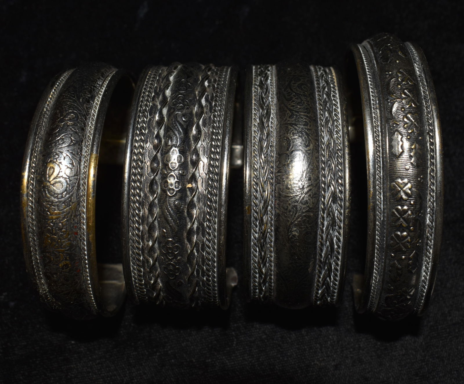 4 Silver Indo-Persian Bracelets: 4 Silver Indo-Persian Bracelets. Reinforced internally with a harder metal these the total weight in silver is probably 1/2 to 2/3. Collected by Chuck and Eileen Hoffman while teaching in the Middle E