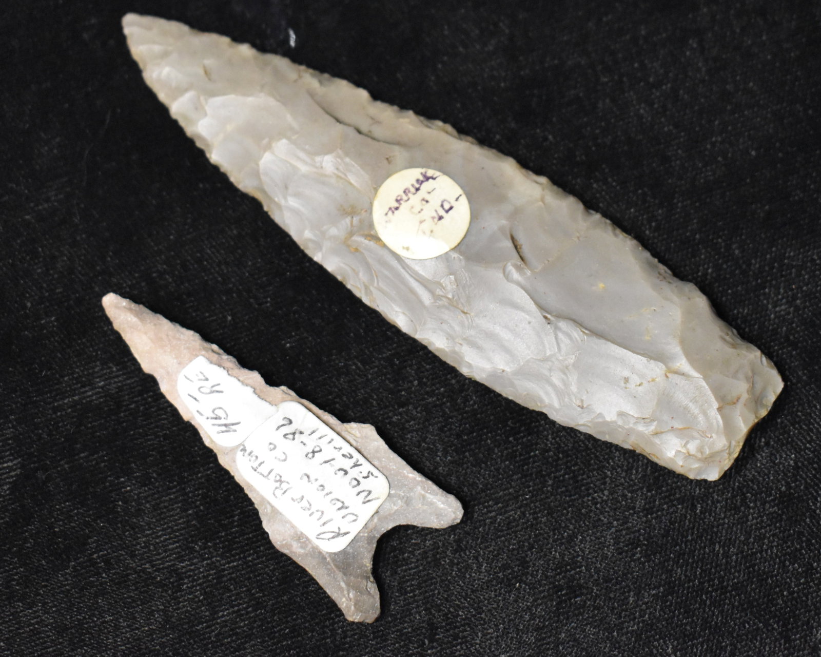 2 Arrowheads - Rechiped or Modern - 2 1/8" and 4": 2 Arrowheads - Rechiped or Modern - 2 1/8" and 4". The longer spear head is rechipped on the edge. The dalton appears to be modern.