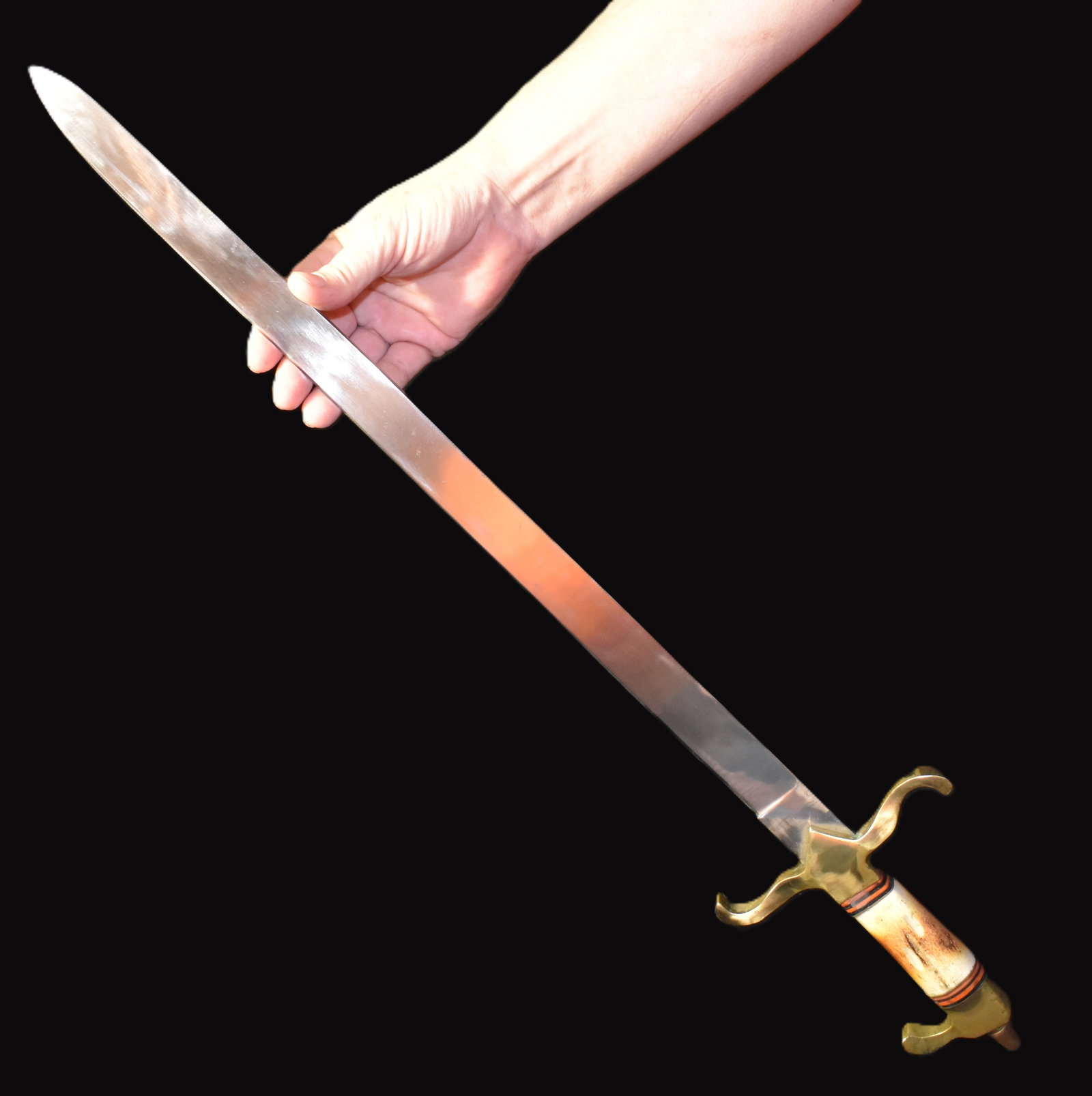 28" Vintage Ole Smokey Short Sword or Bayonet: Ole Smoky Knife is a brand that was founded in the 1970s. The brand is known for producing high-quality knives and tools geared toward camping, hunting, and survival. Ole Smoky Knives offers a wide ra