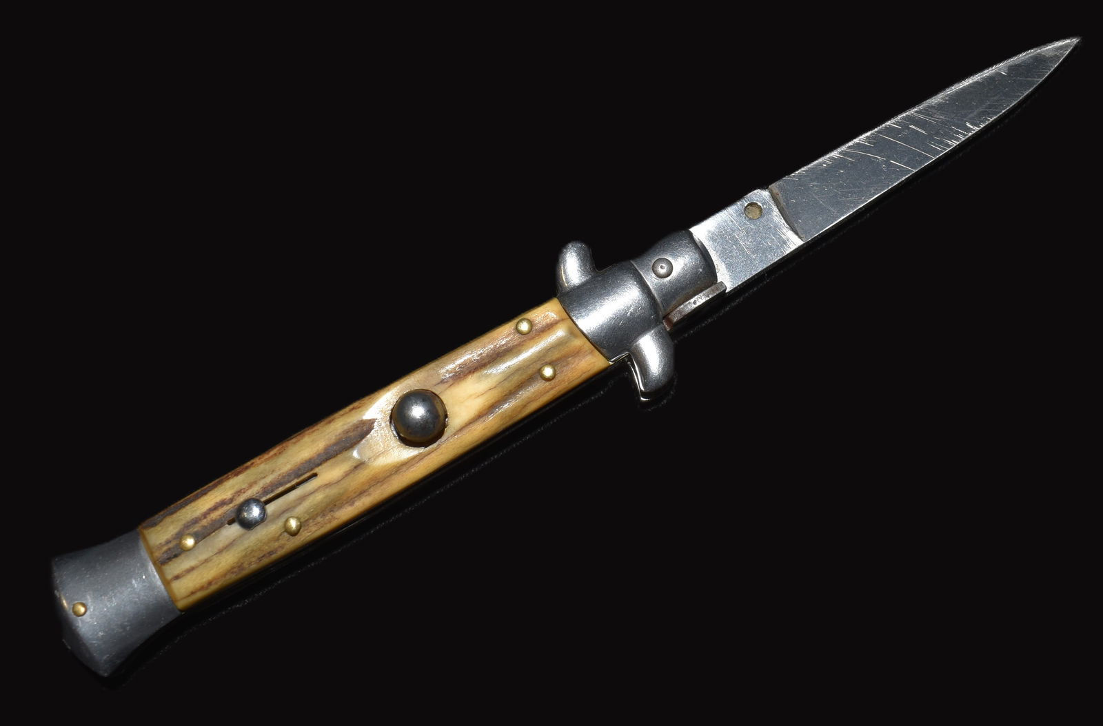 Vintage Rostfrei Italian Stiletto Bone Antler Handle Switchblade Pocket Knife: Rostfrei Italian Stiletto Bone Antler Handle Switchblade Pocket Knife. Very good condition for its age. Works nicely as intended with functioning locking mechanism. Some use wear to blade with minor p