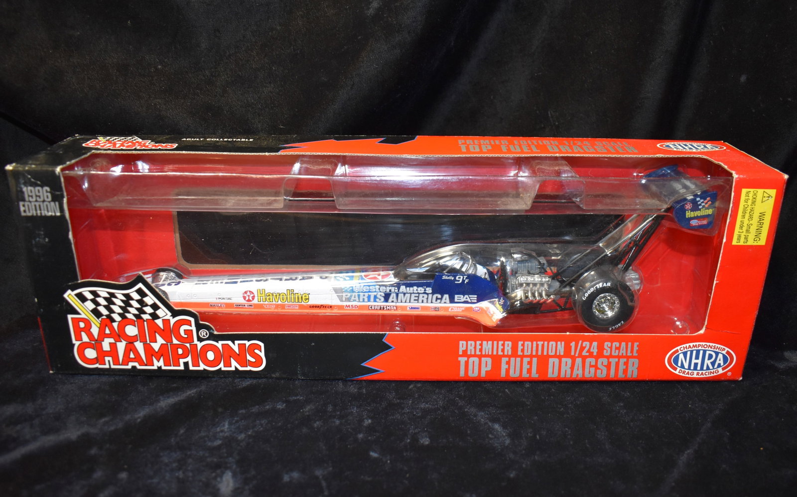 1996 American International Top Fuel Dragster 1:24 Scale Diecast Car. NHRA RACING CHAMPIONS: 1996 American International Top Fuel Dragster 1:24 Scale Diecast Car. NHRA RACING CHAMPIONS. New old stock. NIB