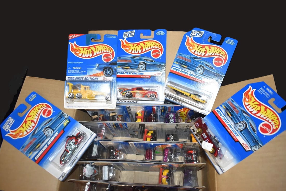Mattel Hot Wheels Assortment contains 36 cars 1990's to 2001: Mattel Hot Wheels Assortment contains 36 cars 1990's to 2001. 1:64 Scale Diecast Cars. All cars are brand new and in their original card. The cars in the box probably don't match the numbers on the ou