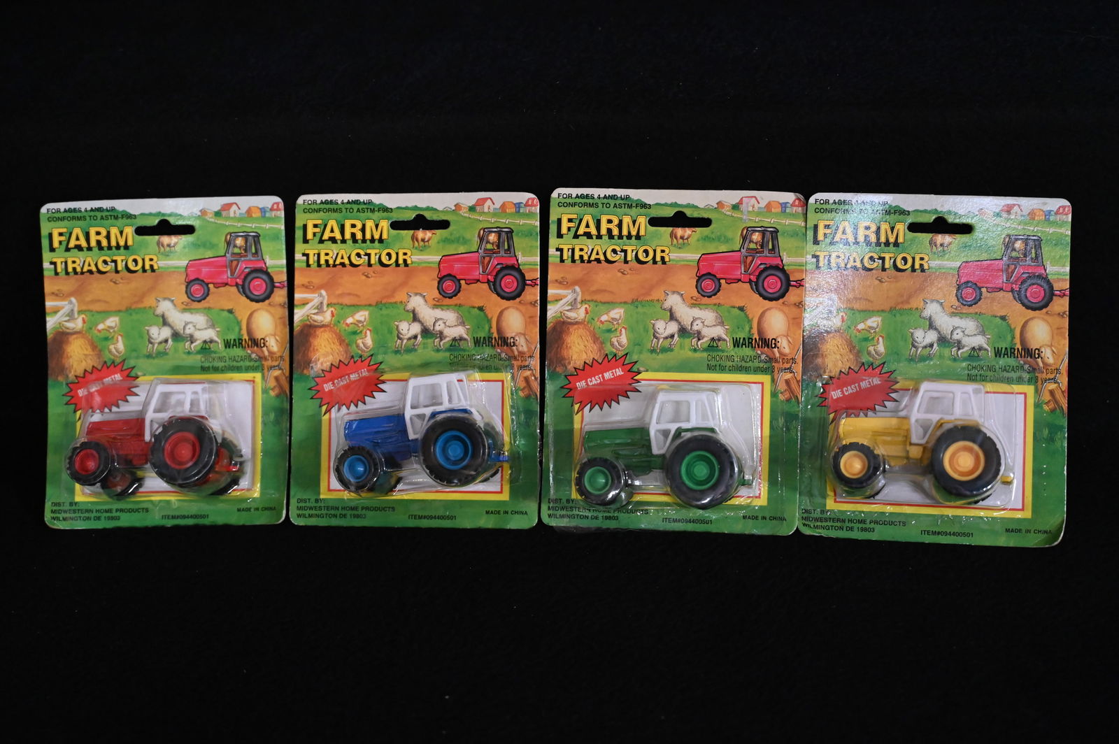 4 Die Cast Metal Farm Tractors produced by Midwestern Home Products and still in the original (1 of 3)