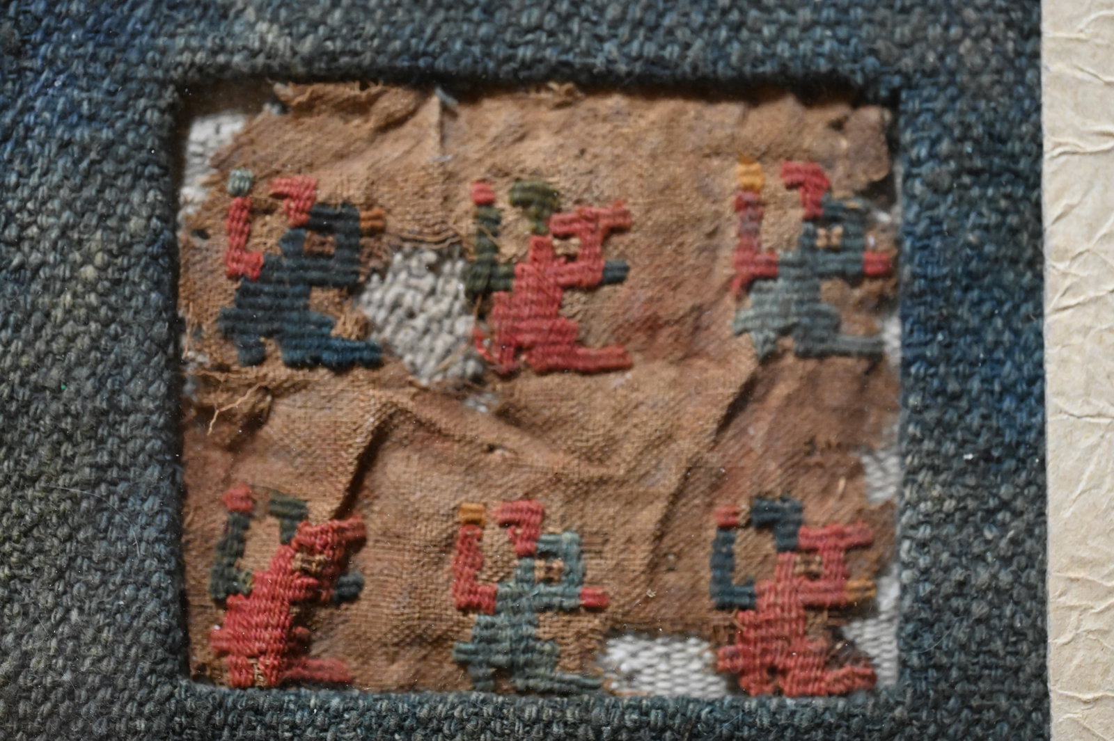 Pre-Columbian Nasca Embroidery of Small Animals 200 BCE to 600 CE: Nasca Embroidery Made by the Nasca 200 BCE to 600 CE. Colorful example of the traditional textiles made by the Nasca people. Made of camelid fibre and cotton. Nicely framed long ago. This embroidery m