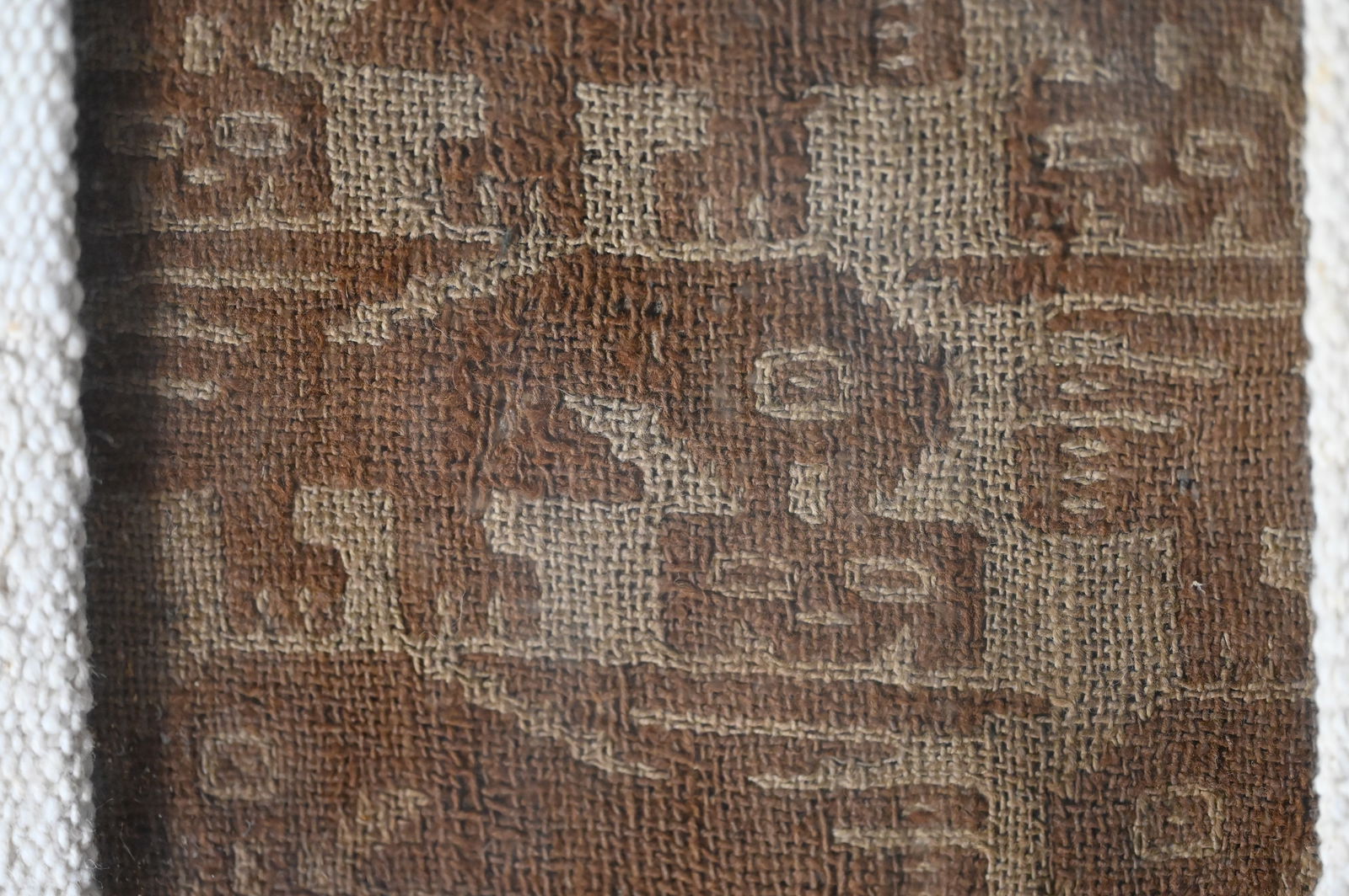 Pre-Columbian Chancay Textile Fragment Depicting a Bird Pecking or Eating a Human Head (1 of 9)