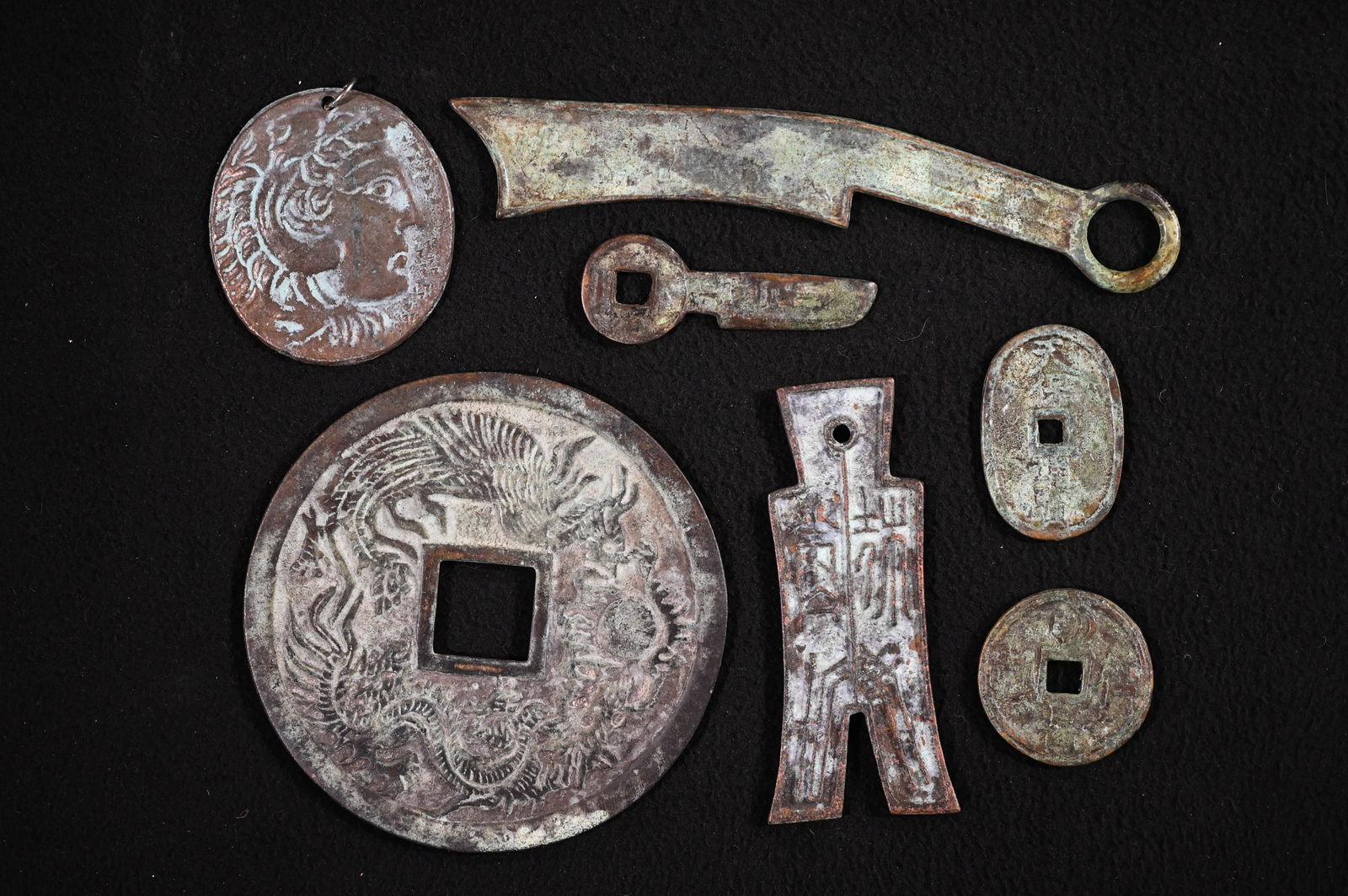 Chinese and Roman Bronze Coins and Pendants Age Unknown. (1 of 7)