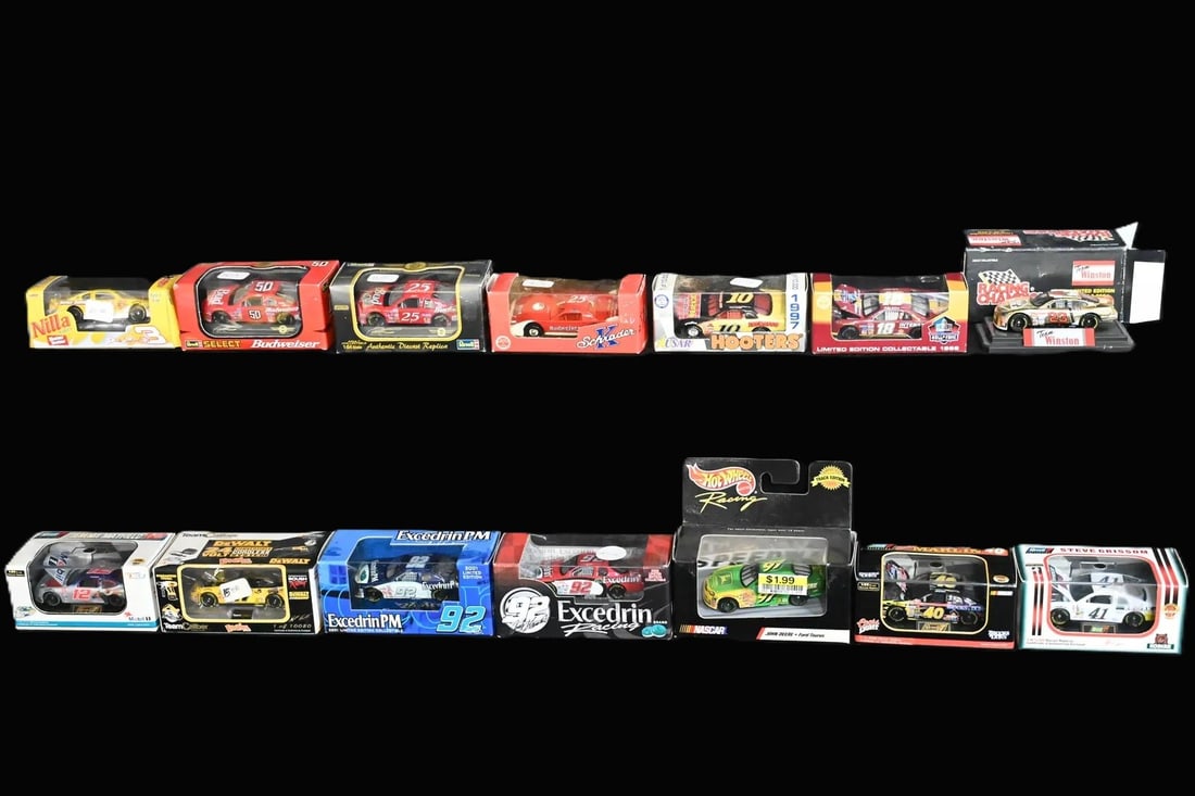 14 NASCAR 1/64 Scale Die Cast 90's Racecars produced by Revell, Racing Champions, Hot Wheels, and: 14 NASCAR 1/64 Scale Die Cast 90's Racecars produced by Revell, Racing Champions, Hot Wheels, and more.