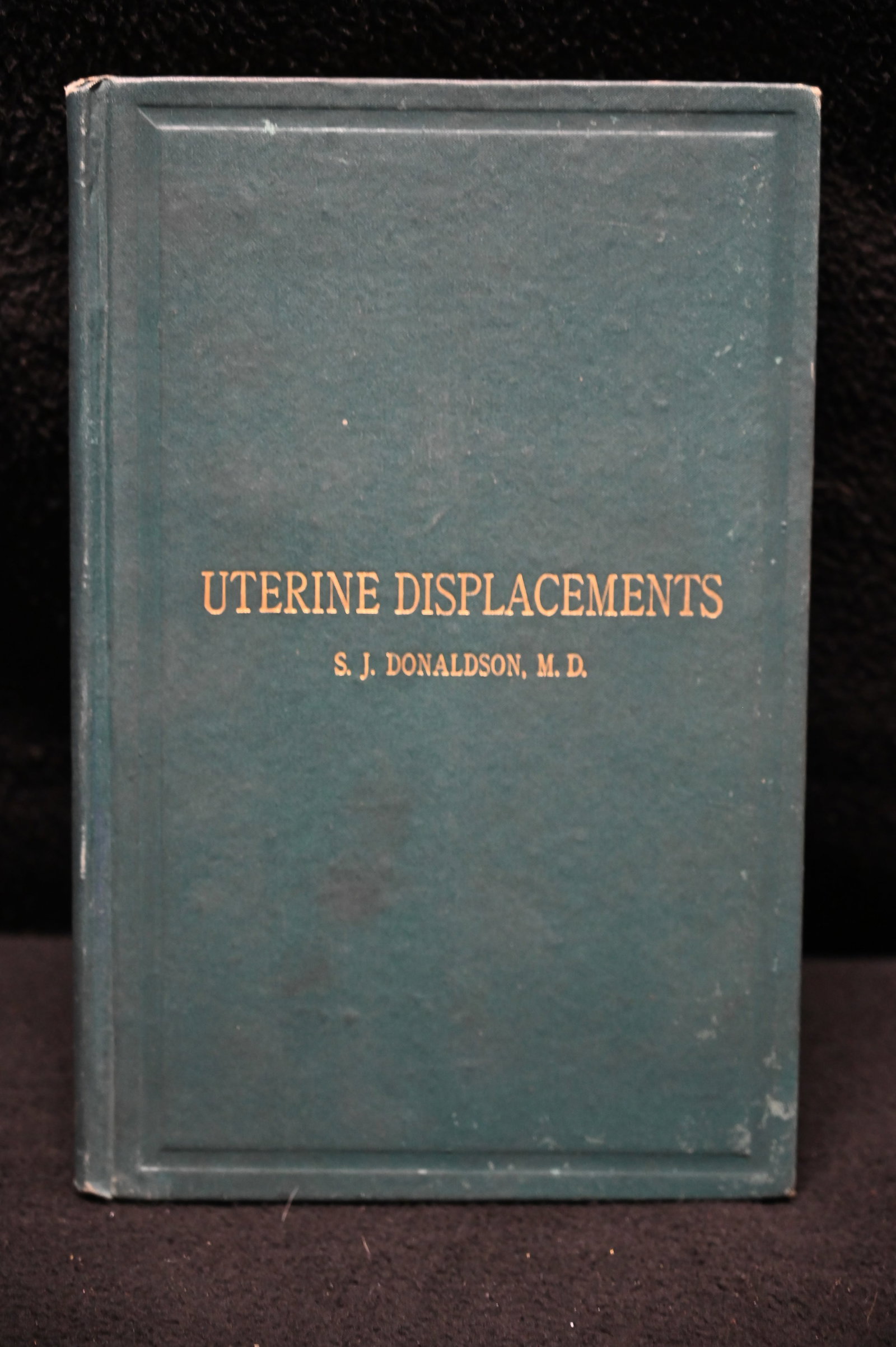 1883 A Treatise on Uterine Displacements: A Treatise on Uterine Displacements by S J Donaldson. Published by Boston, Otis Clapp & Son 1883. 2nd revised edition. Excellent condition. Publishers original green cloth hardback with gold gilt. 83 