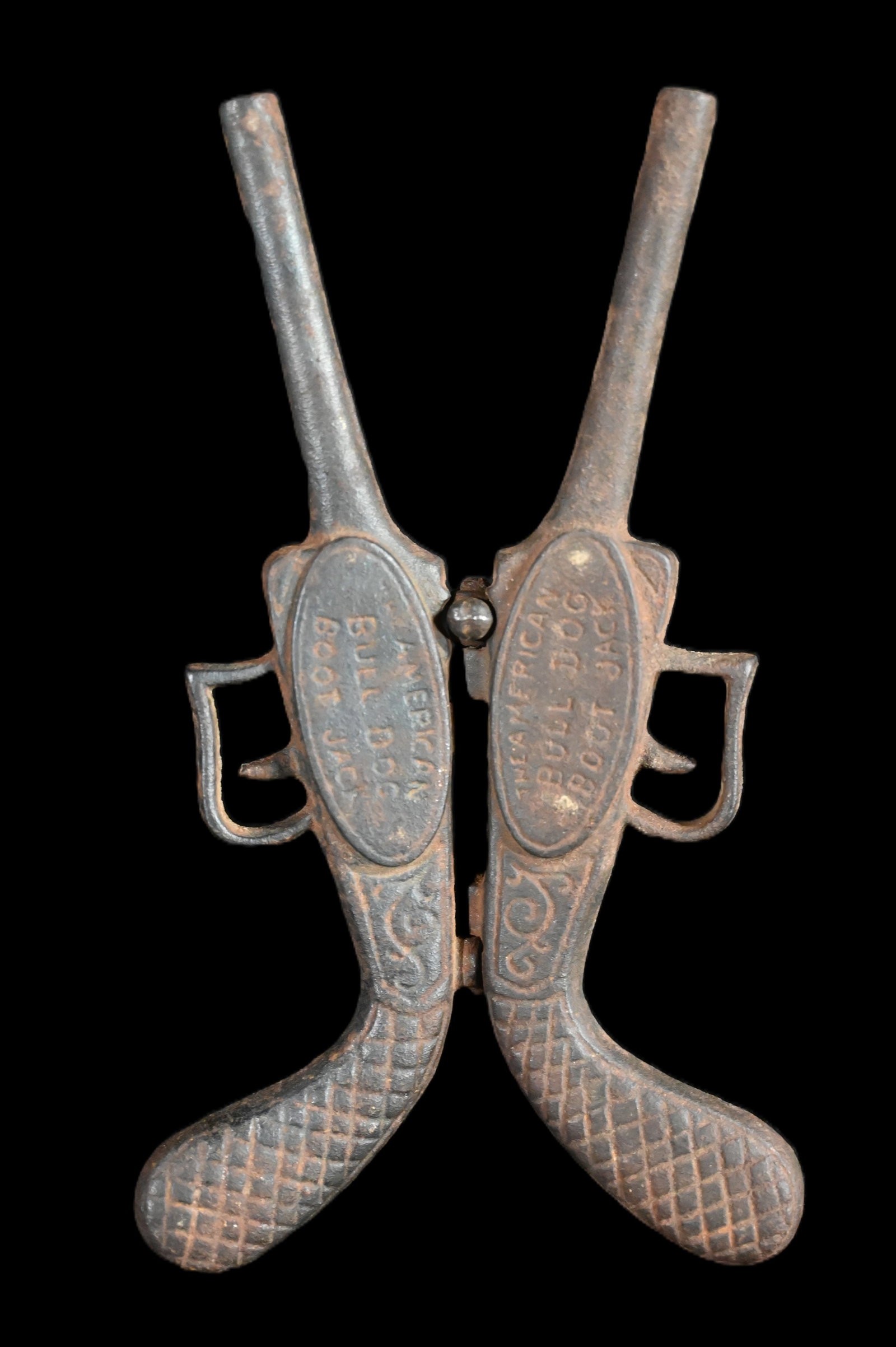 The American Bulldog Gun Shaped Cast Iron Bootjack.: The American Bulldog Gun Shaped Cast Iron Bootjack.