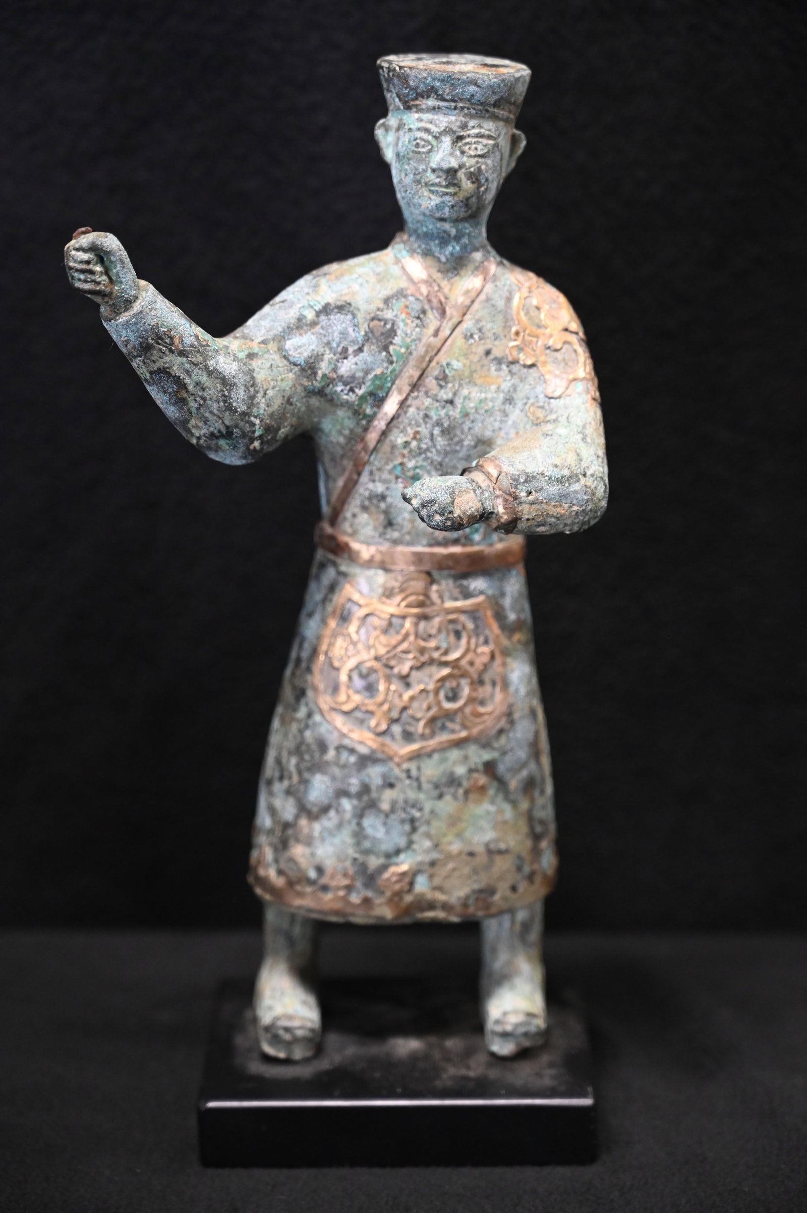 Chinese Bronze Ware Sanxingdui Gold Dynasty Figure 11" Tall: The Sanxingdui culture, part of China's Bronze Age, is renowned for its extraordinary bronze artifacts, including figures with intricate designs. These figures often feature exaggerated facial feature