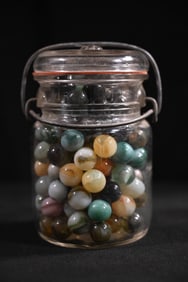 Vintage Jar Full of Marbles.