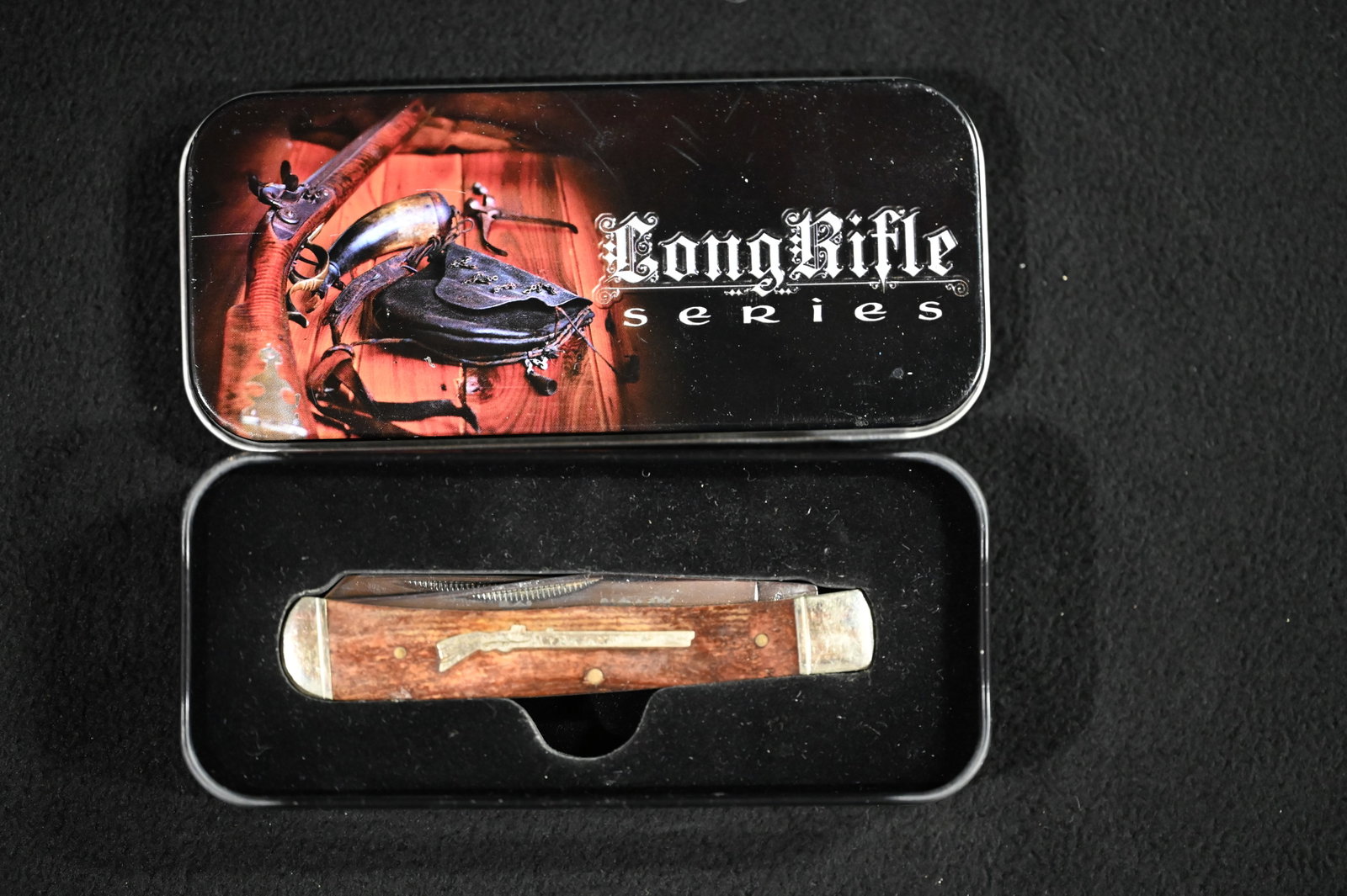 Rough Rider Long Rifle Series 2 Blade Pocket Knife in a Collectible Metal Tin.: Rough Rider Long Rifle Series 2 Blade Pocket Knife in a Collectible Metal Tin.
