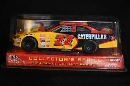 2003 Ward Burton "Caterpillar" Racing Champions NASCAR 1/24 Scale Die Cast Stock Car.