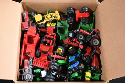 Approx. 40 Toy Tractors and Combines includes John Deere, International, Ford, and more 1/64 Scale.