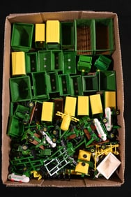 Approx. 50 John Deere Toy Farm Implements and Trailers 1/64 Scale.