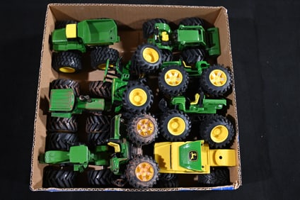 9 John Deere Tractor Toys with soft rubber wheels.