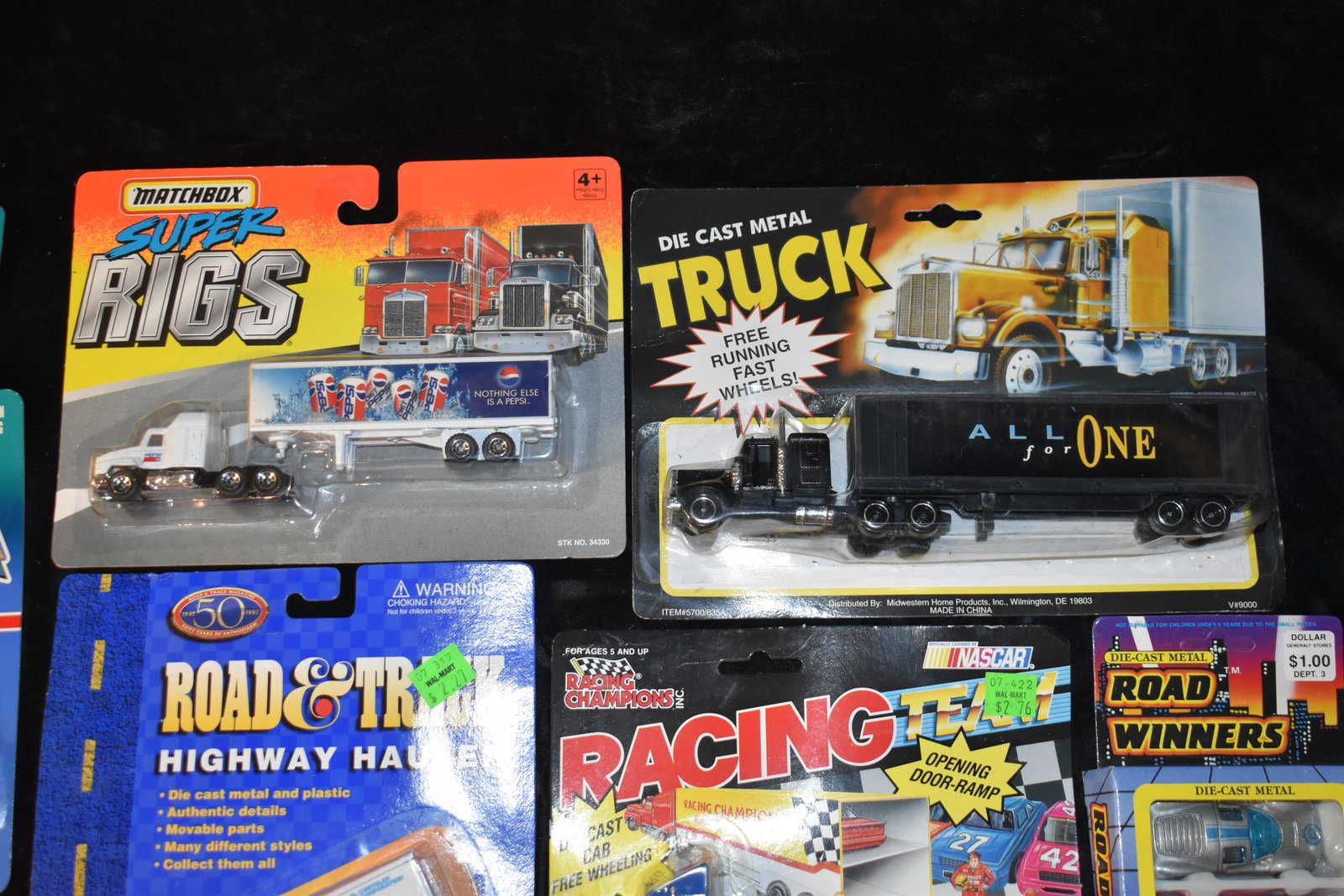 24 Diecast Cars Semi Trucks, Batman Etc. Hot wheels & other Makers - 1/144 Scale to 1/64 Scale: 24 Diecast Cars Semi Trucks, Batman Etc. Hot wheels & other Makers - 1/144 Scale to 1/64 Scale. New in their boxes or packages.