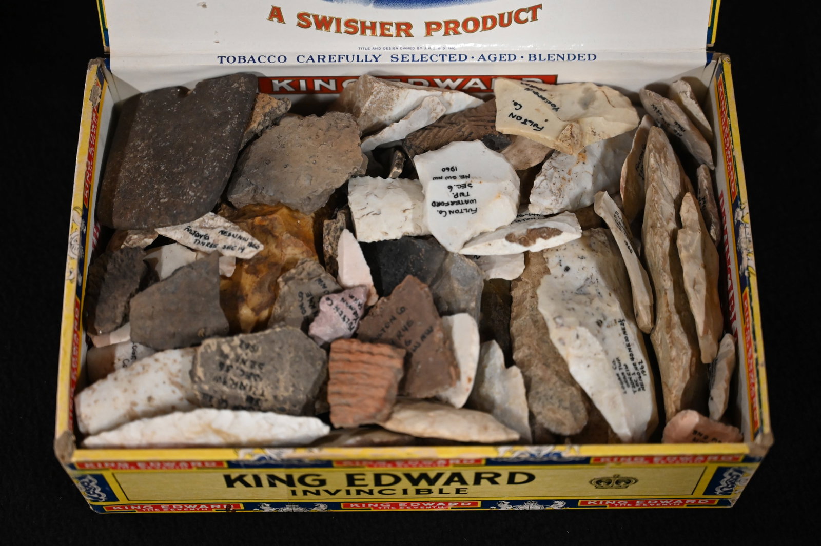 Cigar Box Full of Damaged Arrowheads Found in Fulton Co. Illinois and surrounding Counties. Cigar: Cigar Box Full of Damaged Arrowheads Found in Fulton Co. Illinois and surrounding Counties. Cigar Box measures approx.. 8 1/2" x 5 1/2" x 3". Weighs approx.. 5 pounds.