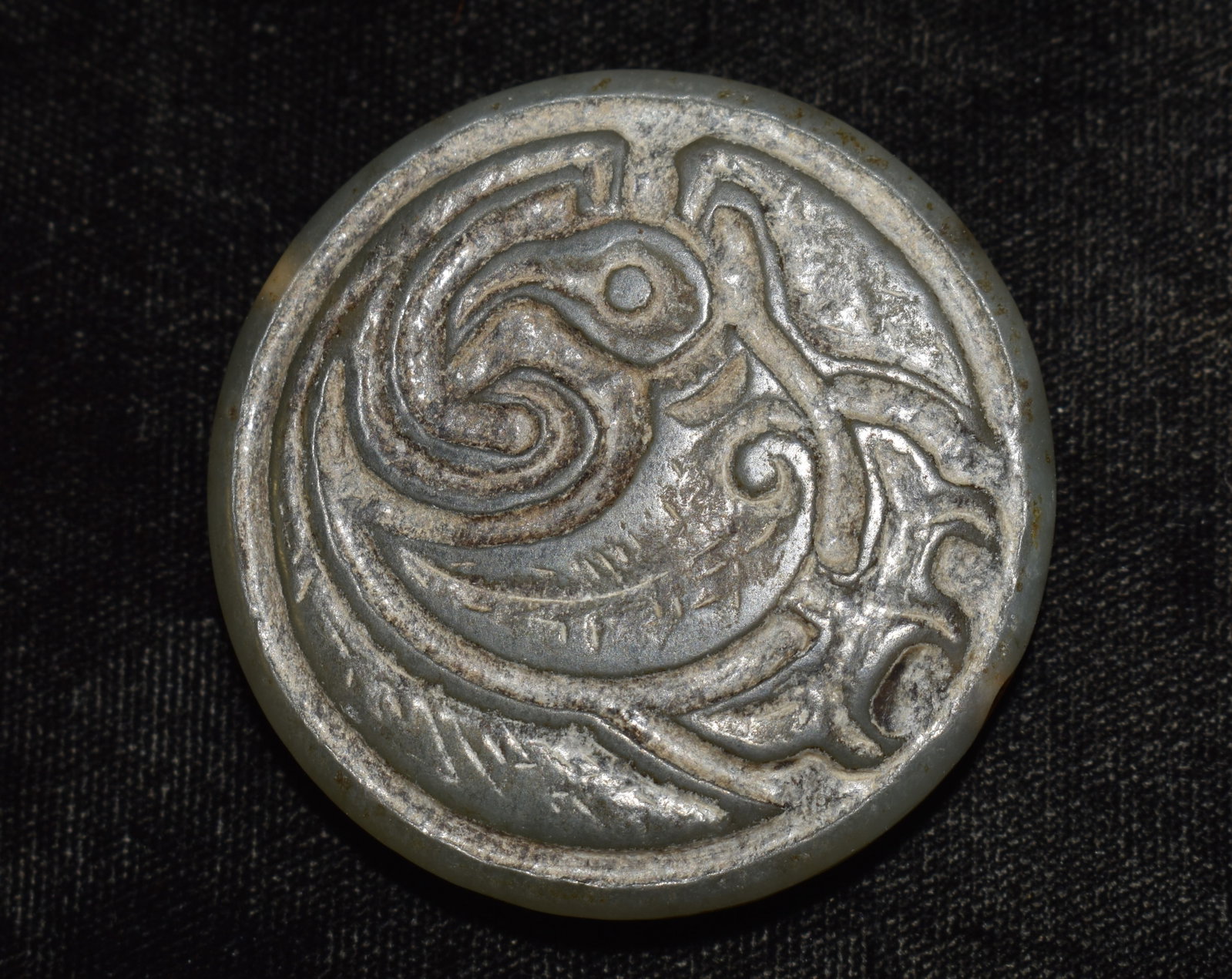 Neolithic Jade Pendant found in China: Neolithic Jade Pendant found in China. Measures approximately 2" diameter. Ex Ed Butkis Collection