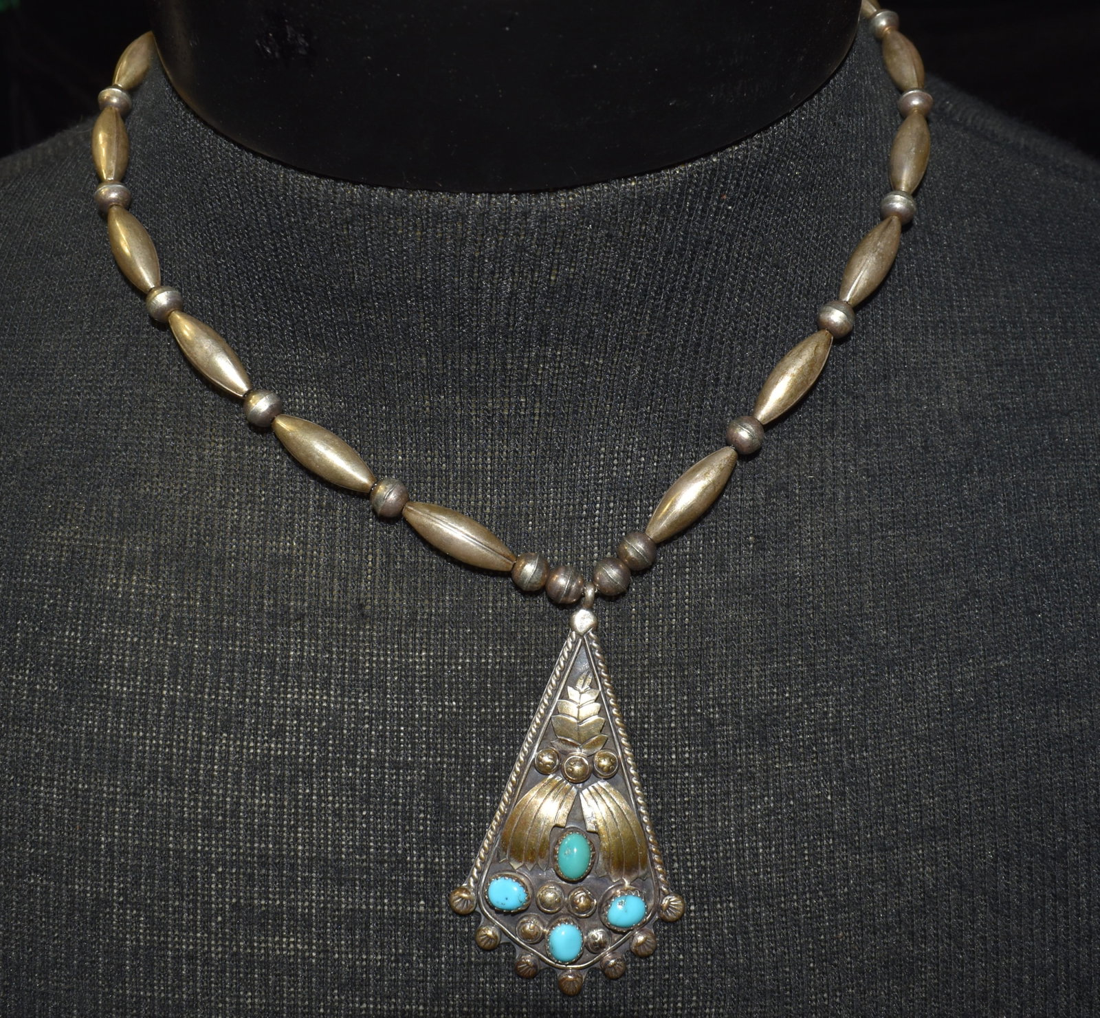 Vintage Navajo Sterling and Turquoise Necklace 32 grams: Vintage Navajo Sterling and Turquoise Necklace 32 grams. Necklace is 17" and Pendant is a little over 2 1/4"