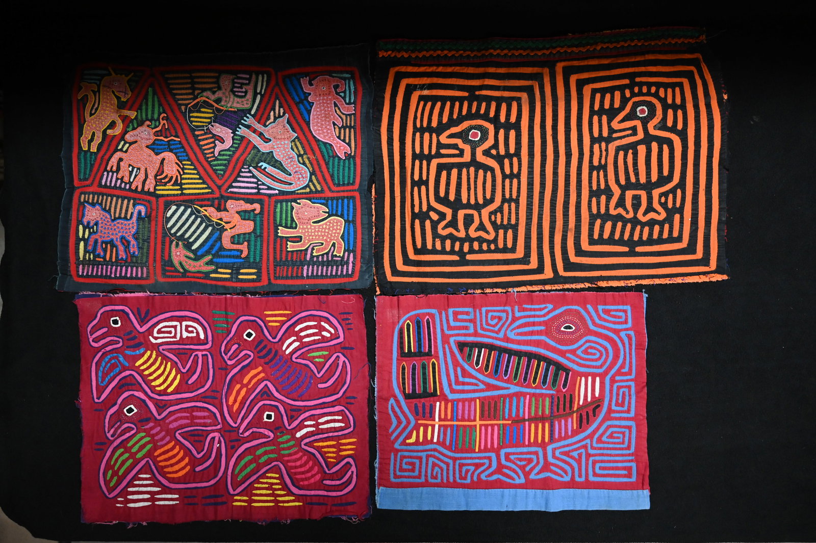 4 San Blas Islands Fabric Pieces. Wild designs in this fabric leave no doubt to their origin.: 4 San Blas Islands Fabric Pieces. Wild designs in this fabric leave no doubt to their origin. These textile display very well and are considered works of art. Measuring 14" x 18" and depicting wild co